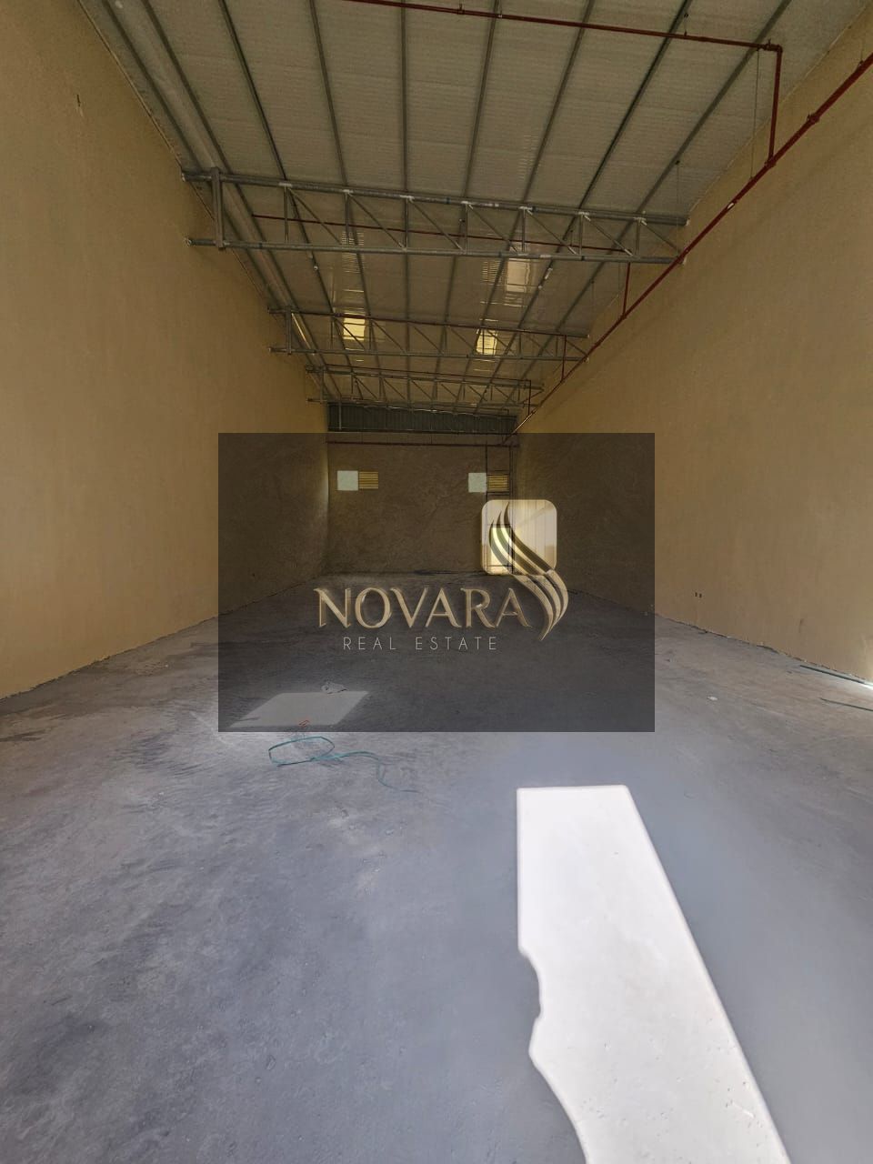 A 2,500 sq ft warehouse in Umm Al Thu'ub, 38 kW electricity, ready for operation, priced at AED 115,000 per year.