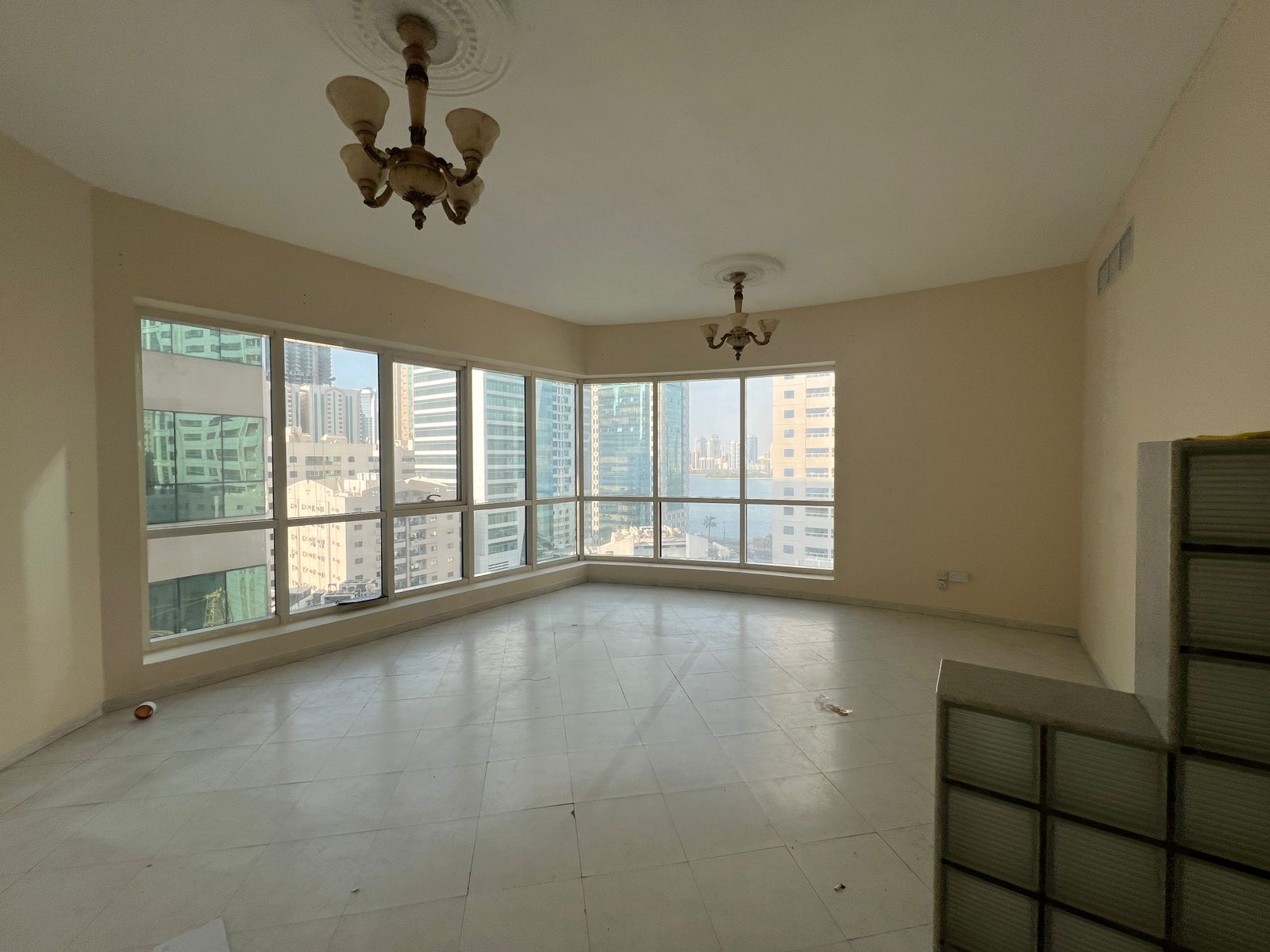 Beautiful 1-bedroom apartment with living room, free AC, gym, and pool in Al Majaz 3.