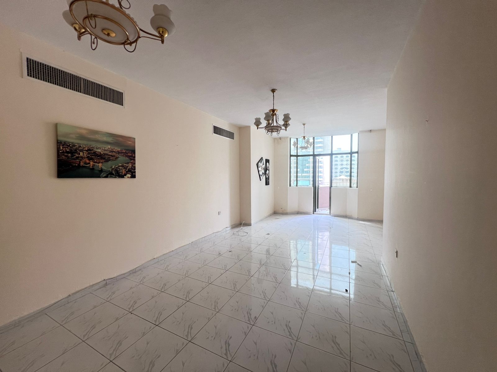 Most Beautiful 3-Bedroom Apartment with Large Living Room, Balcony & Built-in Cabinets, Master Room in Al Majaz 2