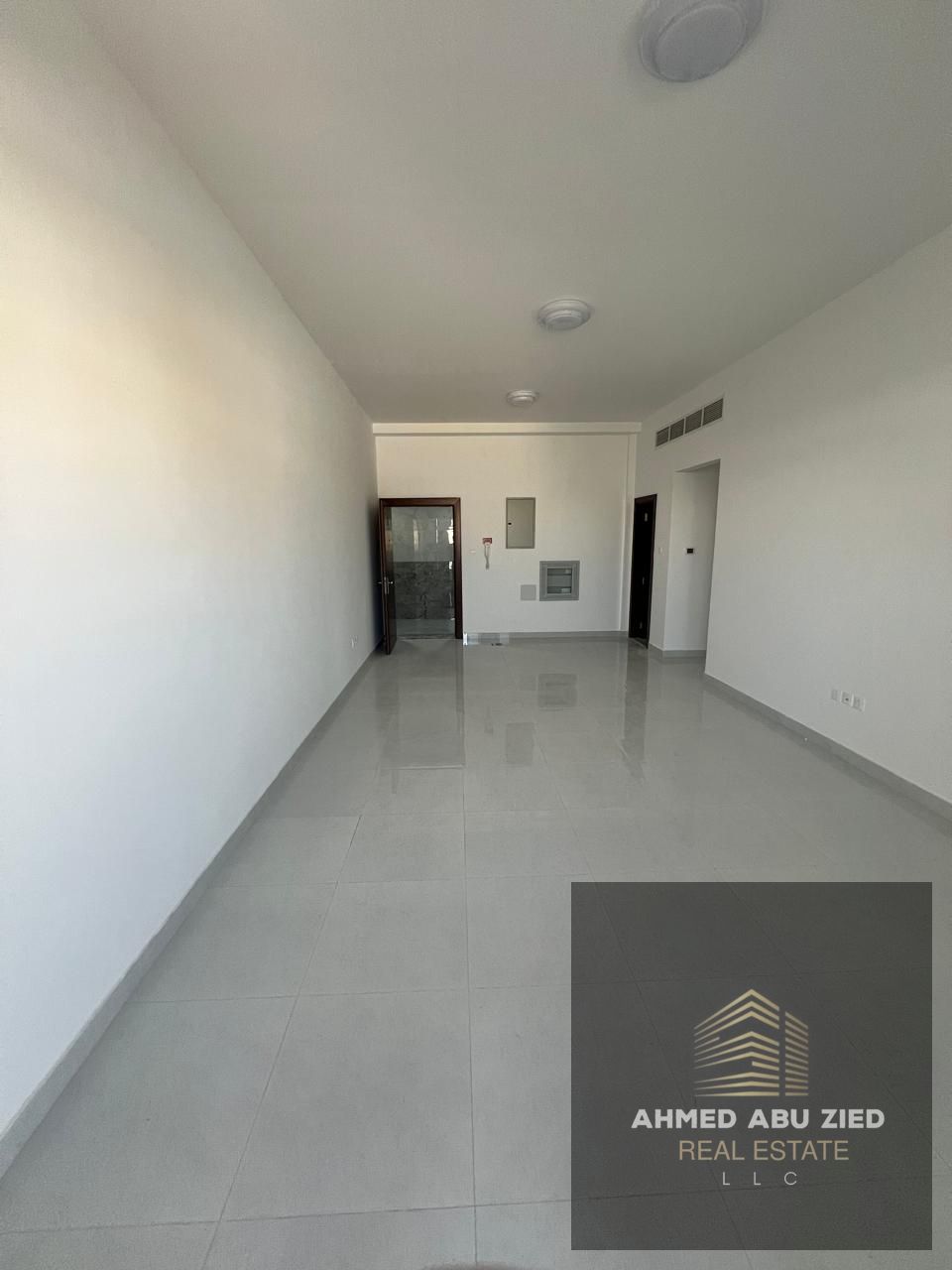 Annual rent: Two master-bedroom apartment with living room in Al Jurf 2, 3 bathrooms, balcony, laundry room, spacious layout, prime location near serv