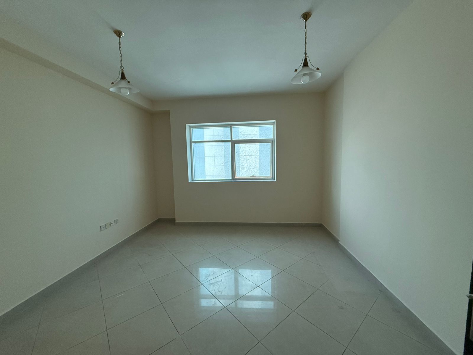 The most beautiful two-bedroom apartment with a spacious living room and wide layout, open view, balcony, built-in wardrobes, modern finishing, prime