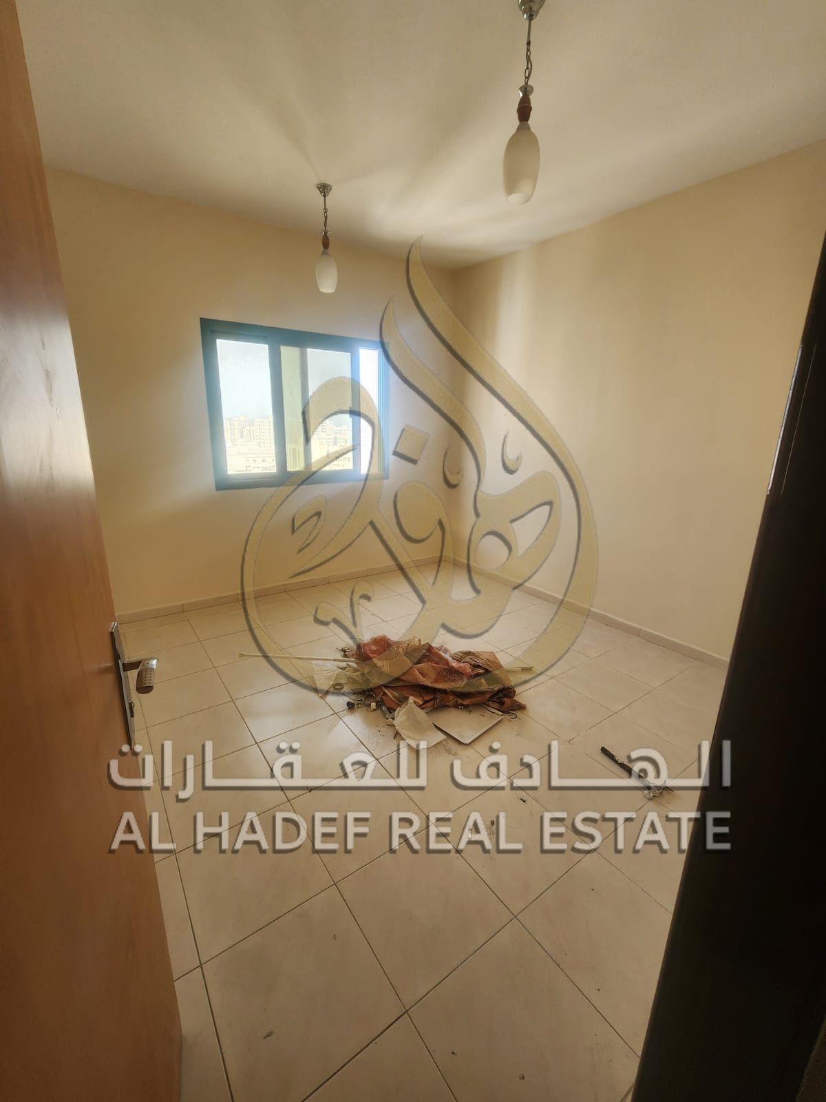 Two-bedroom apartment with a living room, two balconies, and central air conditioning in Al Naba'a