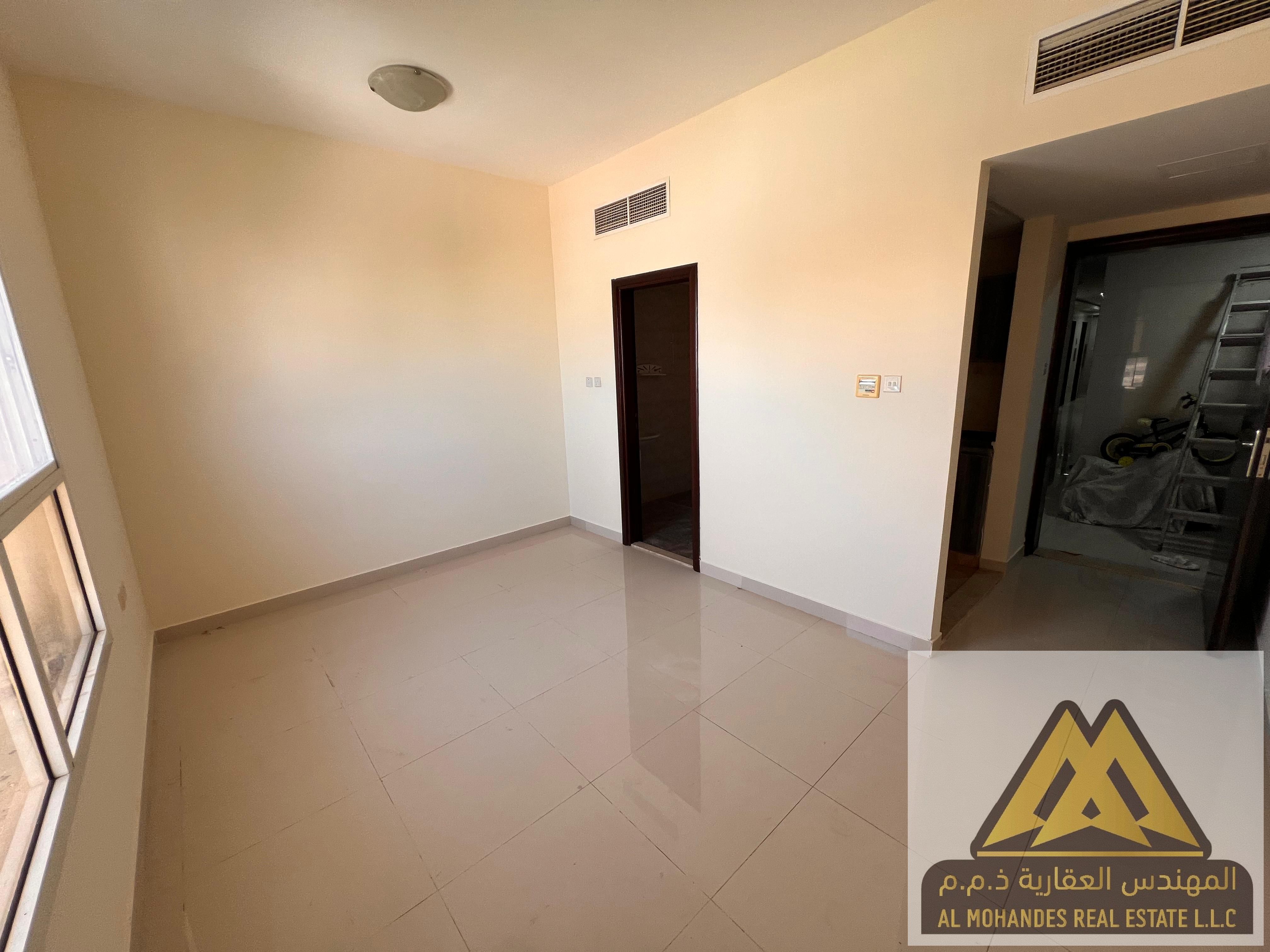 Studio for Annual Rent in Al Naeemia 3, Ajman – Separate Kitchen, 22,000 AED, 4 Payments, Security Deposit via Cheque & Cash