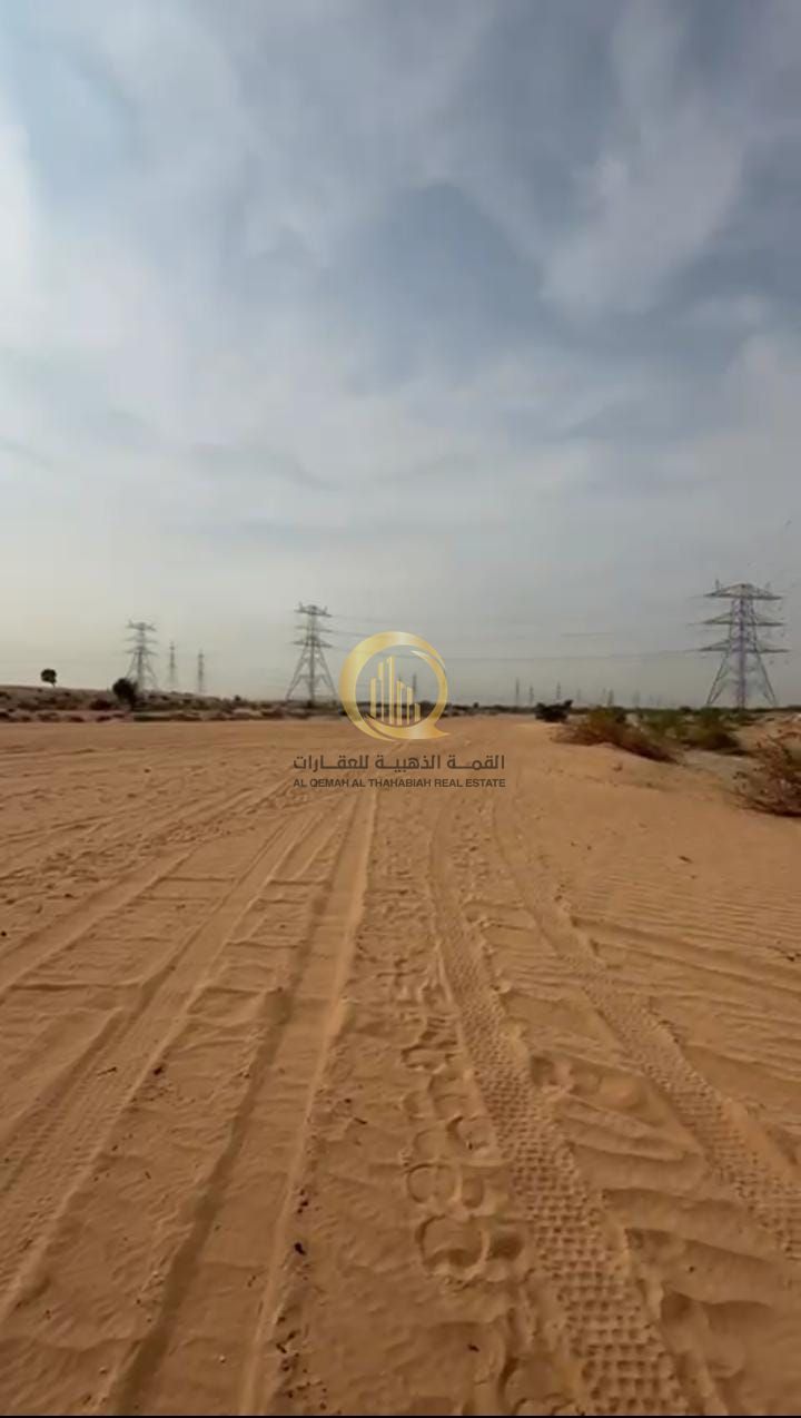 Industrial commercial land for sale in Al-Qasimi City, Phase 1. Area: 19,352 sq. ft. In an excellent location on a 24-meter street.