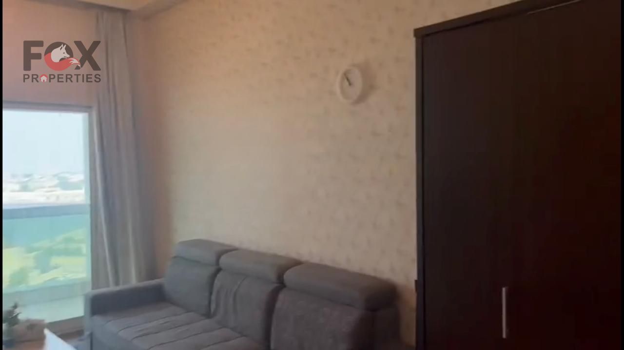 Furnished apartment for rent in Ajman - 2 bedrooms and living room - parking - sea view