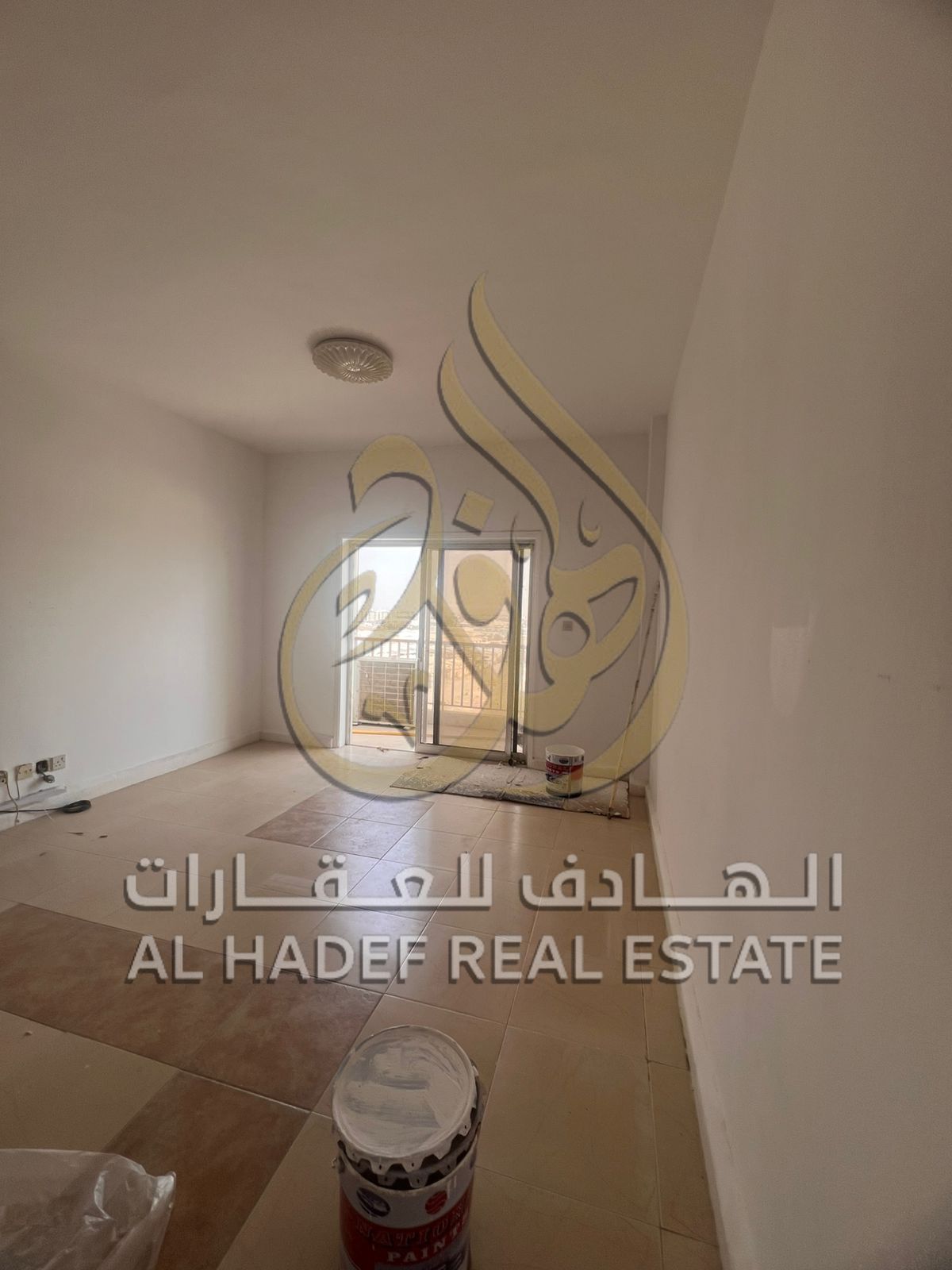 Two-bedroom apartment with a living room for annual rent in Al Majaz 3, Sharjah, with two bathrooms, a functional kitchen, free parking, and payment i