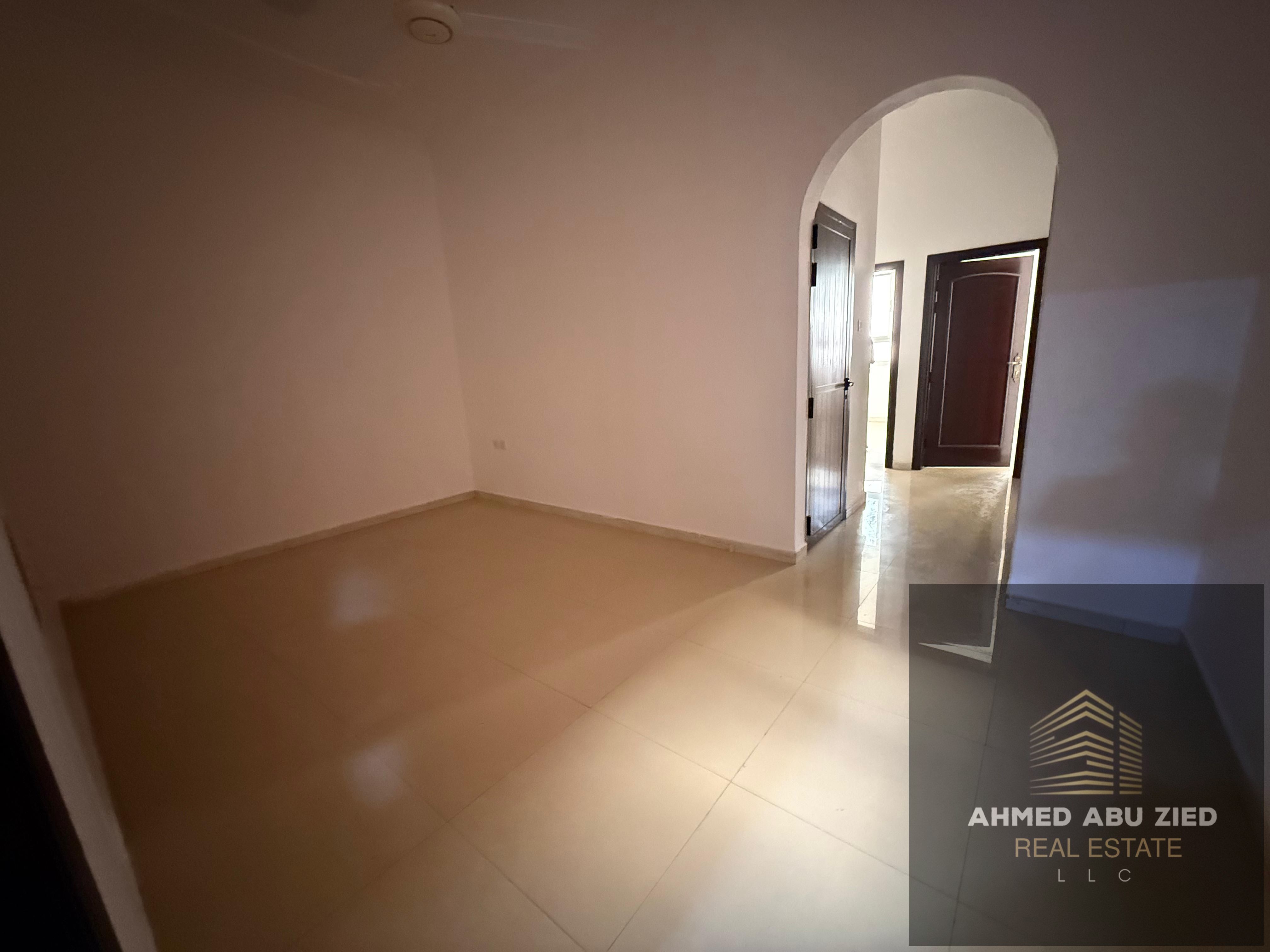 The cheapest two-bedroom apartment for annual rent in Al Rawda 2, Ajman, in a prime location close to services and schools, with the option to pay in