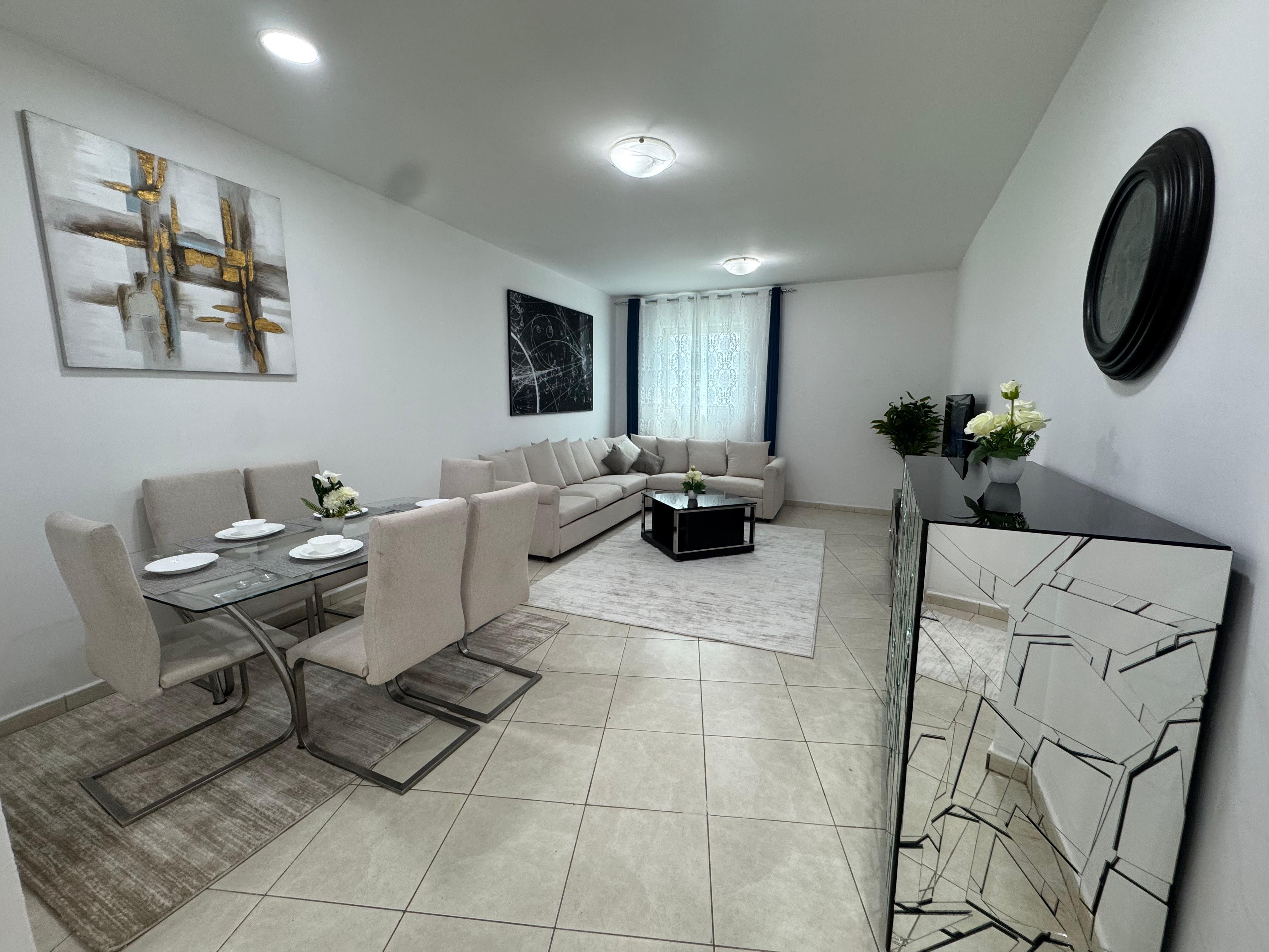 Furnished 2BR apartment on Ajman Corniche, 3 baths, sea-view balcony, all bills & parking included.