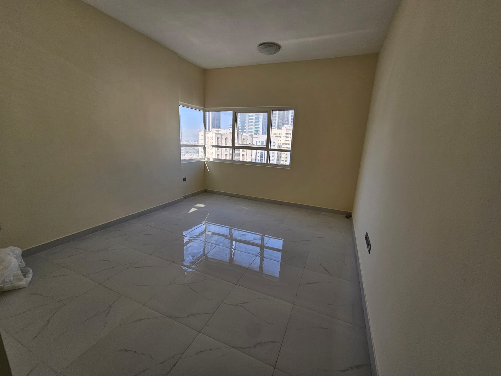 The most beautiful two-bedroom apartment, second tenant, with a spacious living room and wide layout, open view, modern finishing, master bedrooms, pr