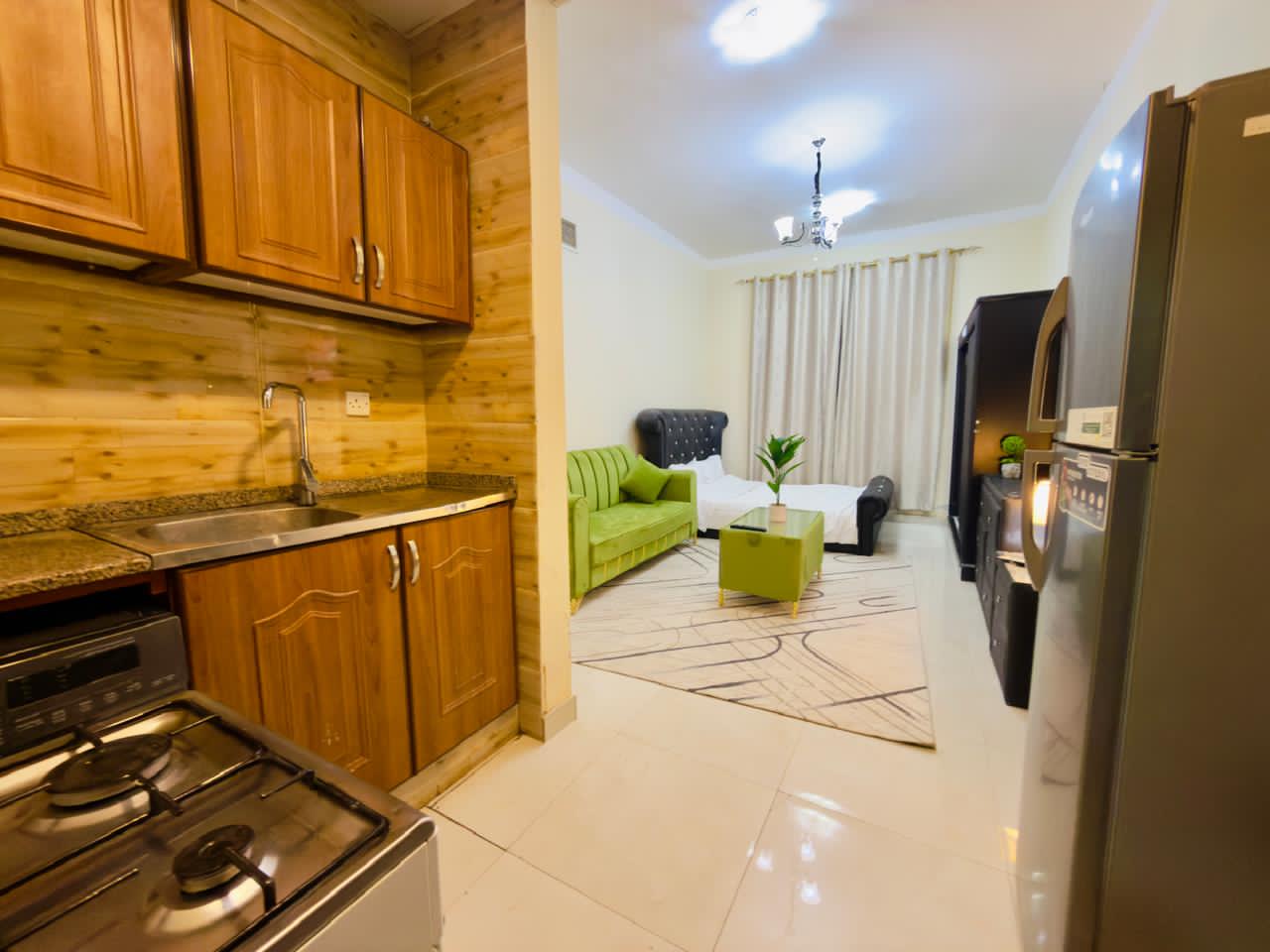Studio apartment with clean furnishings and separate kitchen | Al Rawda 2 | Bills and internet included | Easiest exit to Dubai and Sharjah