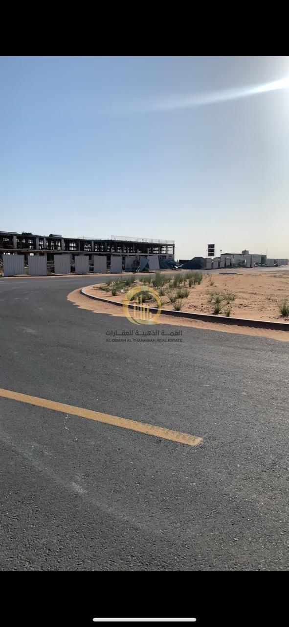 Prime industrial land for sale in Al Qasimia 2, freehold ownership for Arabs and foreigners