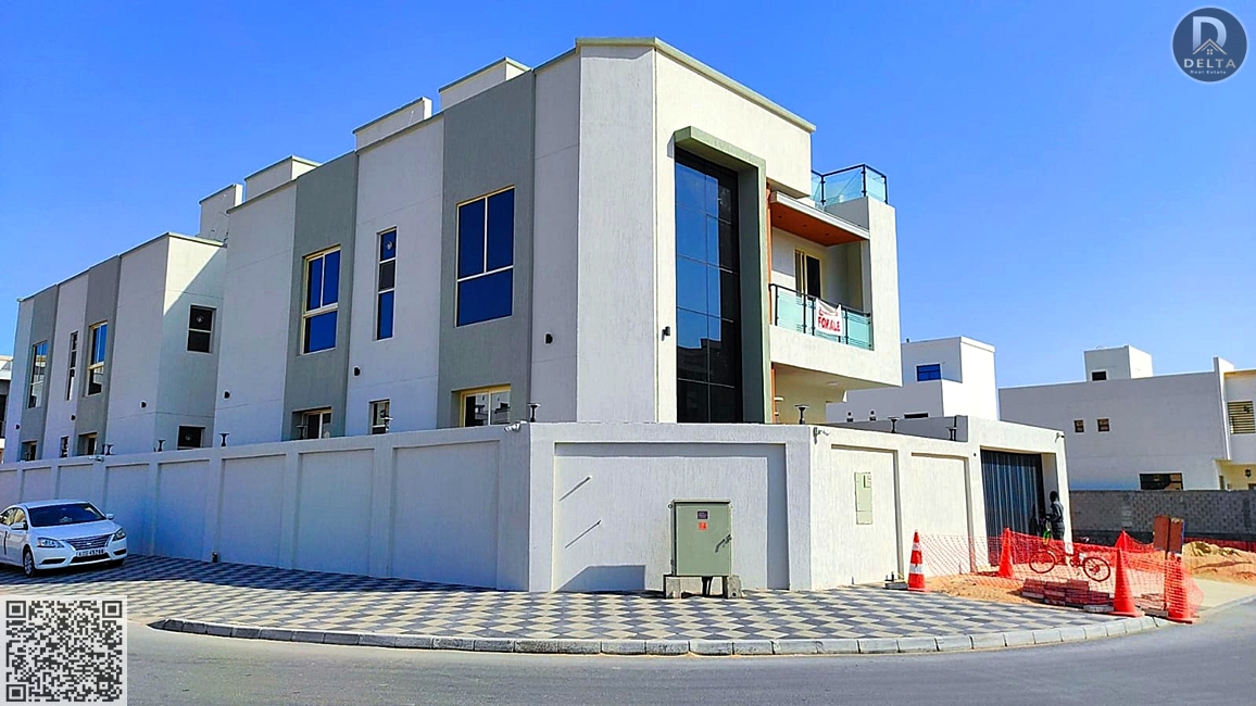 Villa for sale in the quiet Al Yasmin area, featuring special finishes and windows that give it an aesthetic appearance, with a large setback in front