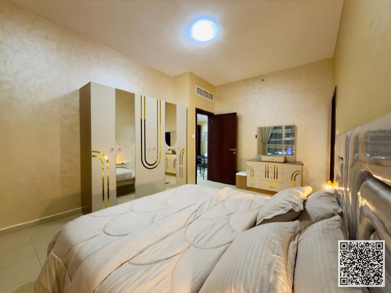 Luxury apartment for monthly rent, one bedroom and a hall with an open view, fully furnished with elegant furniture and a fully equipped kitchen