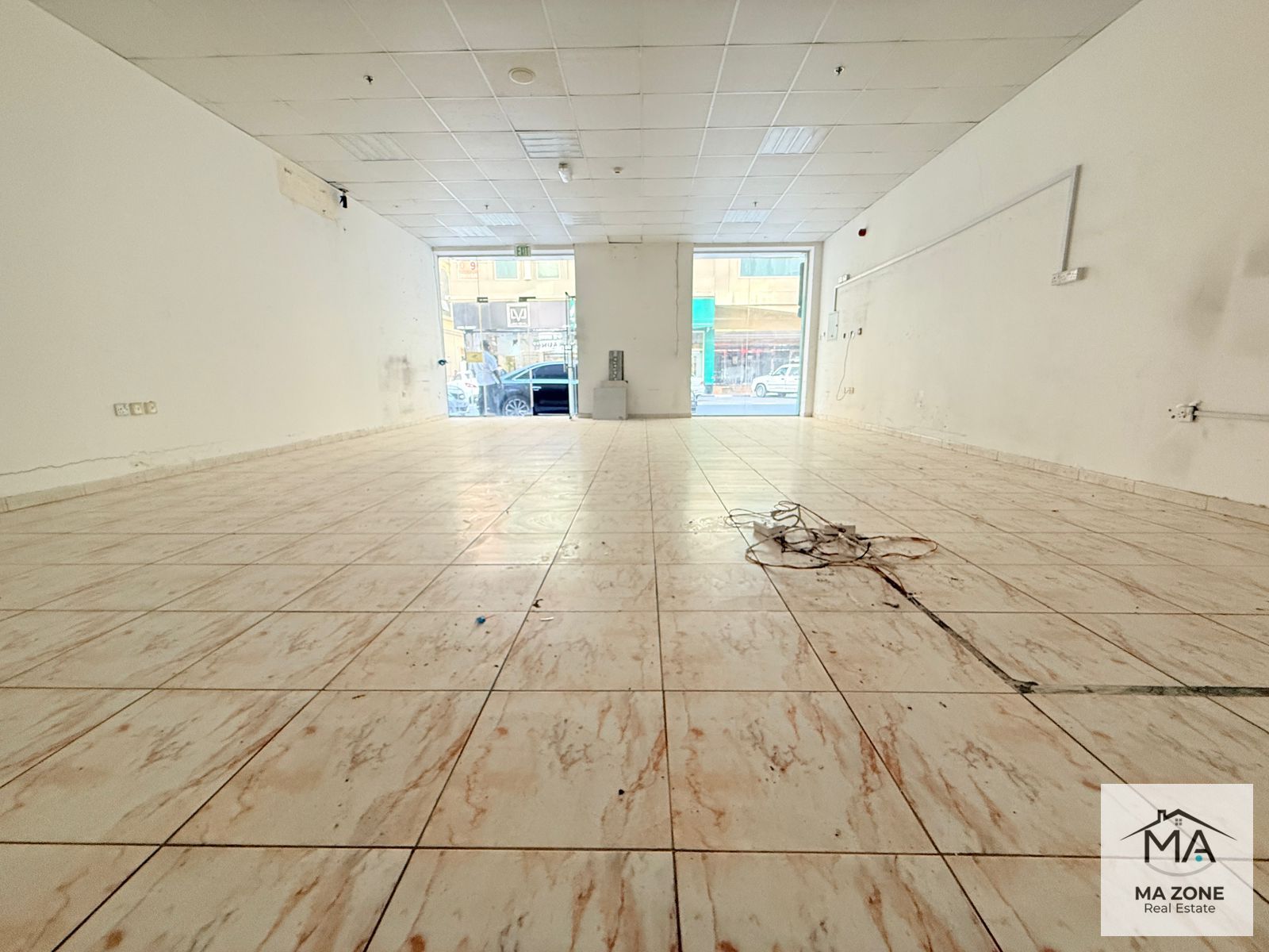 Spacious Shop Prime Location In Muwaileh Commercial,Your Dream Shop Awaits