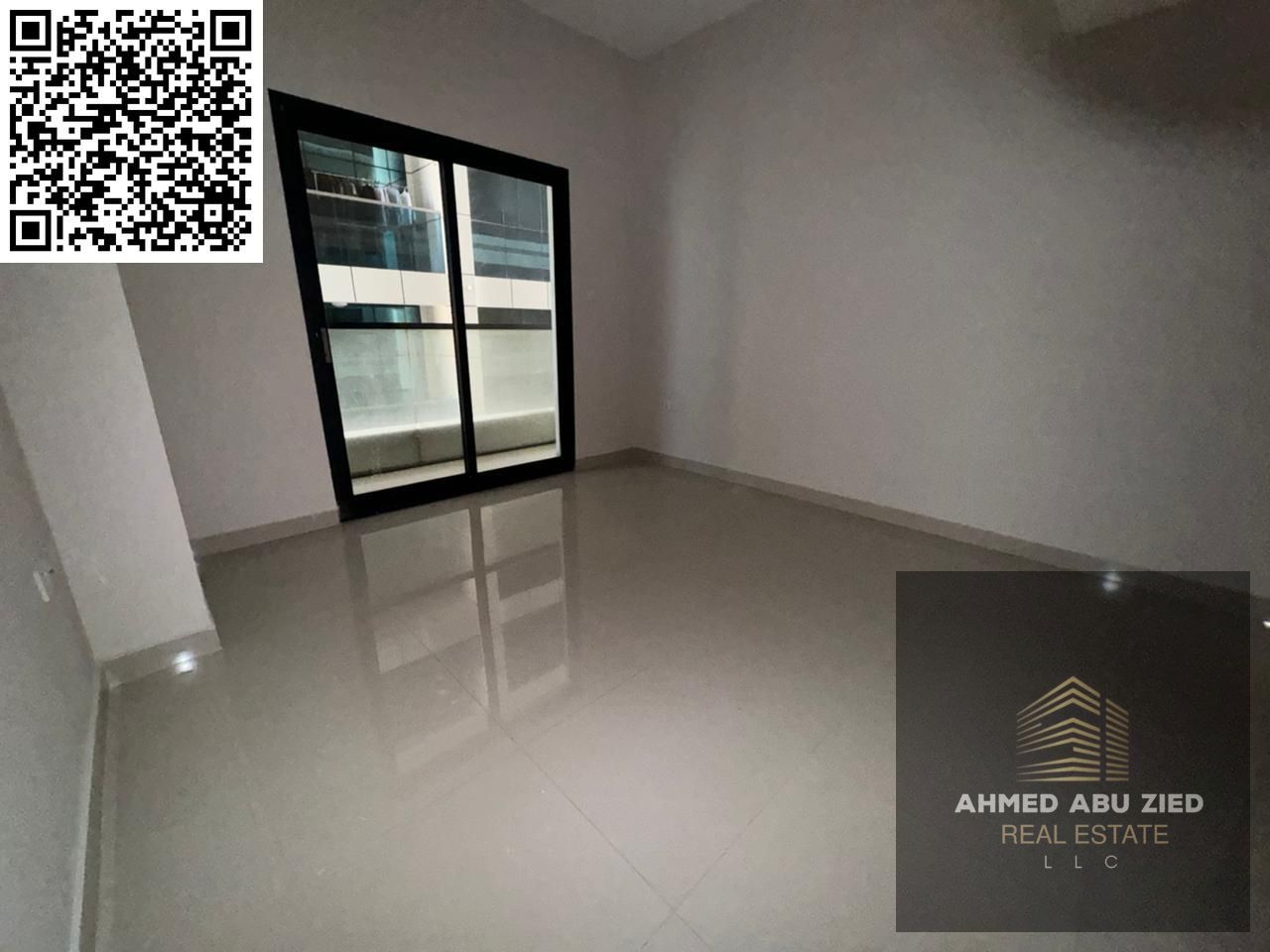 Elegant 2BR apartment for annual rent in Al Rashidiya 1 Ajman with master bedroom, balcony, built-in wardrobes, and private parking in a prime locati