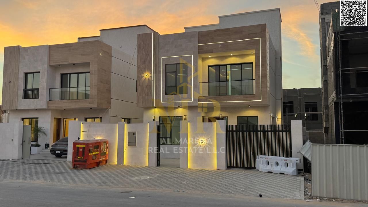 Two-story villa with a roof terrace, 3225 sq ft, price includes registration and ownership fees, ready to move in, in one of Ajman's most prestigious