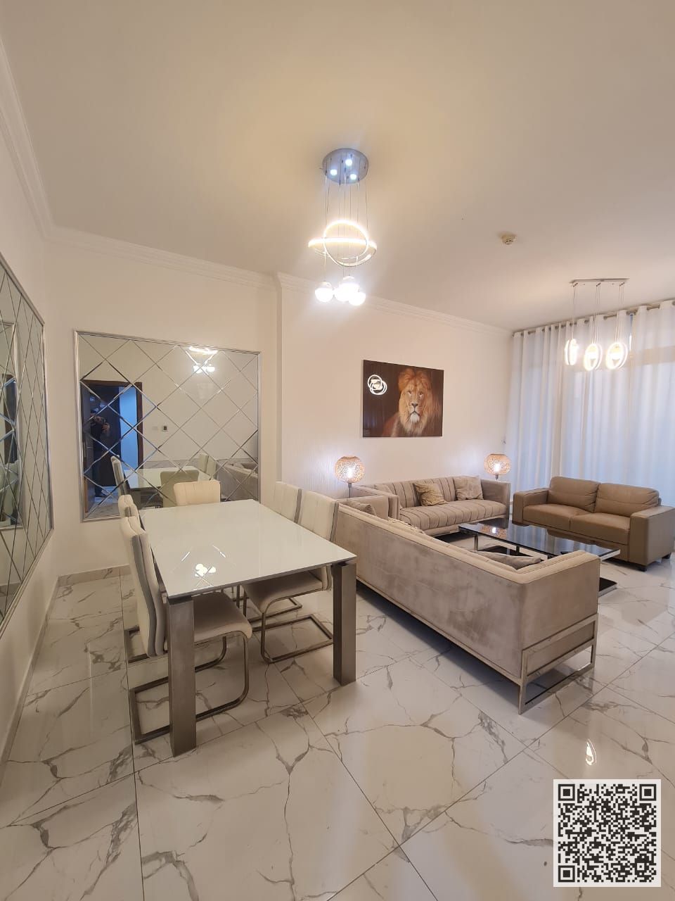 Luxurious fully furnished three-bedroom apartment with a living room for monthly rent in Ajman Includes bills , gym, swimming pool, and parking