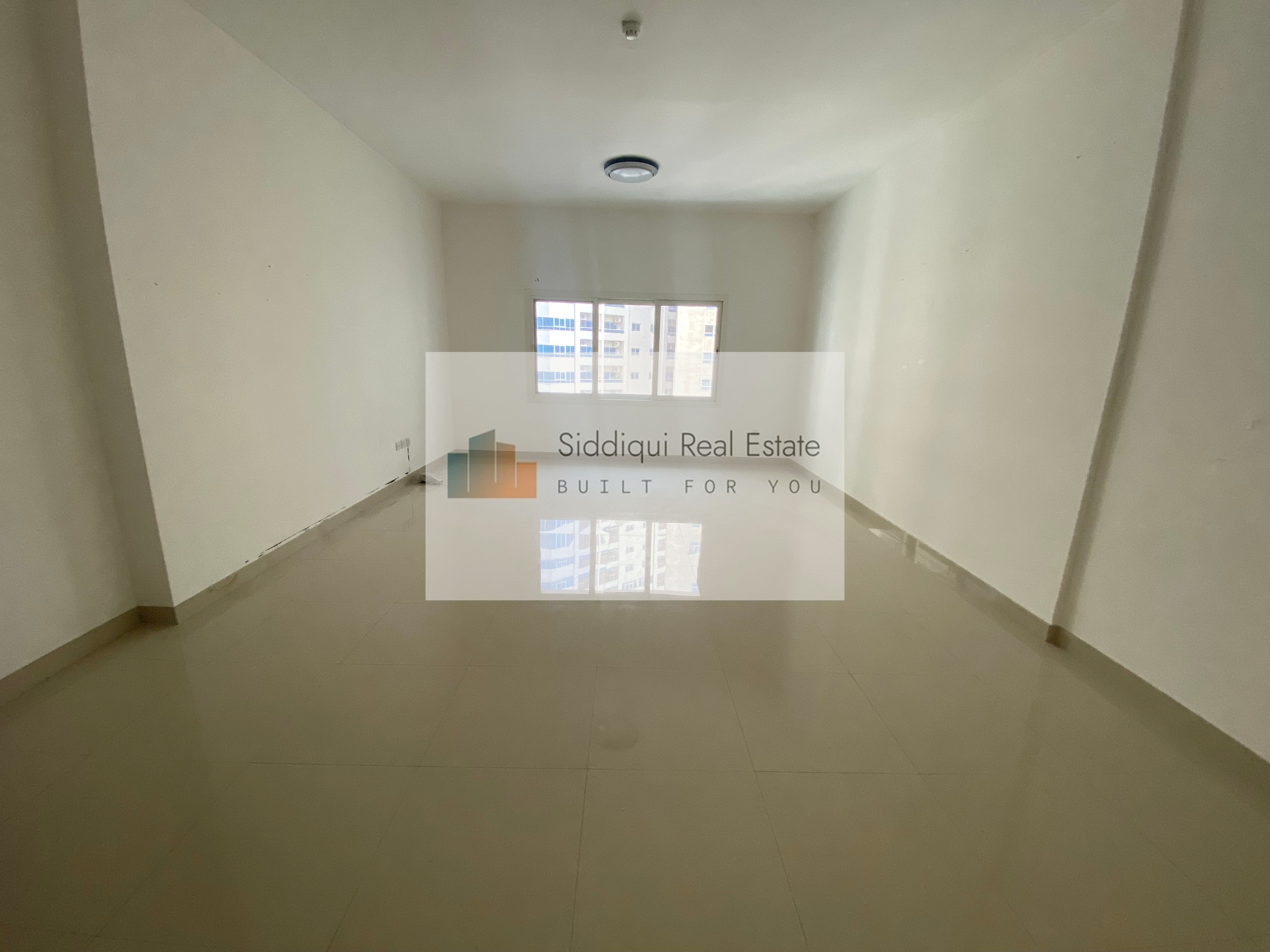 Hot offer 12 Cheque 1bhk 2wasroom one master bedroom with balcony open view very close to Dubai exit available in Al Nahda Sharjah