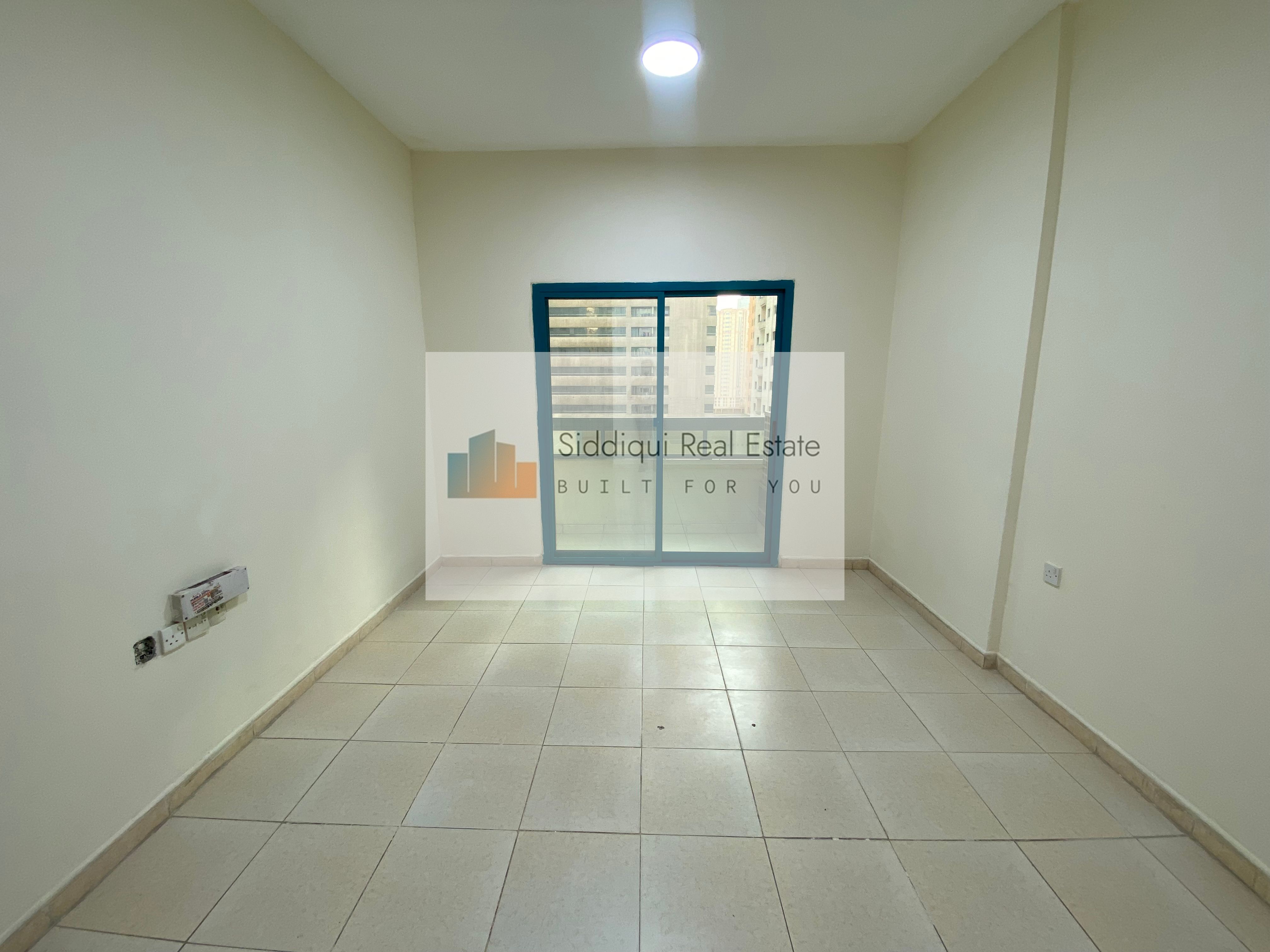 Spacious 1bhk one month free with balcony close to Sahara center available in Al Nahda Sharjah