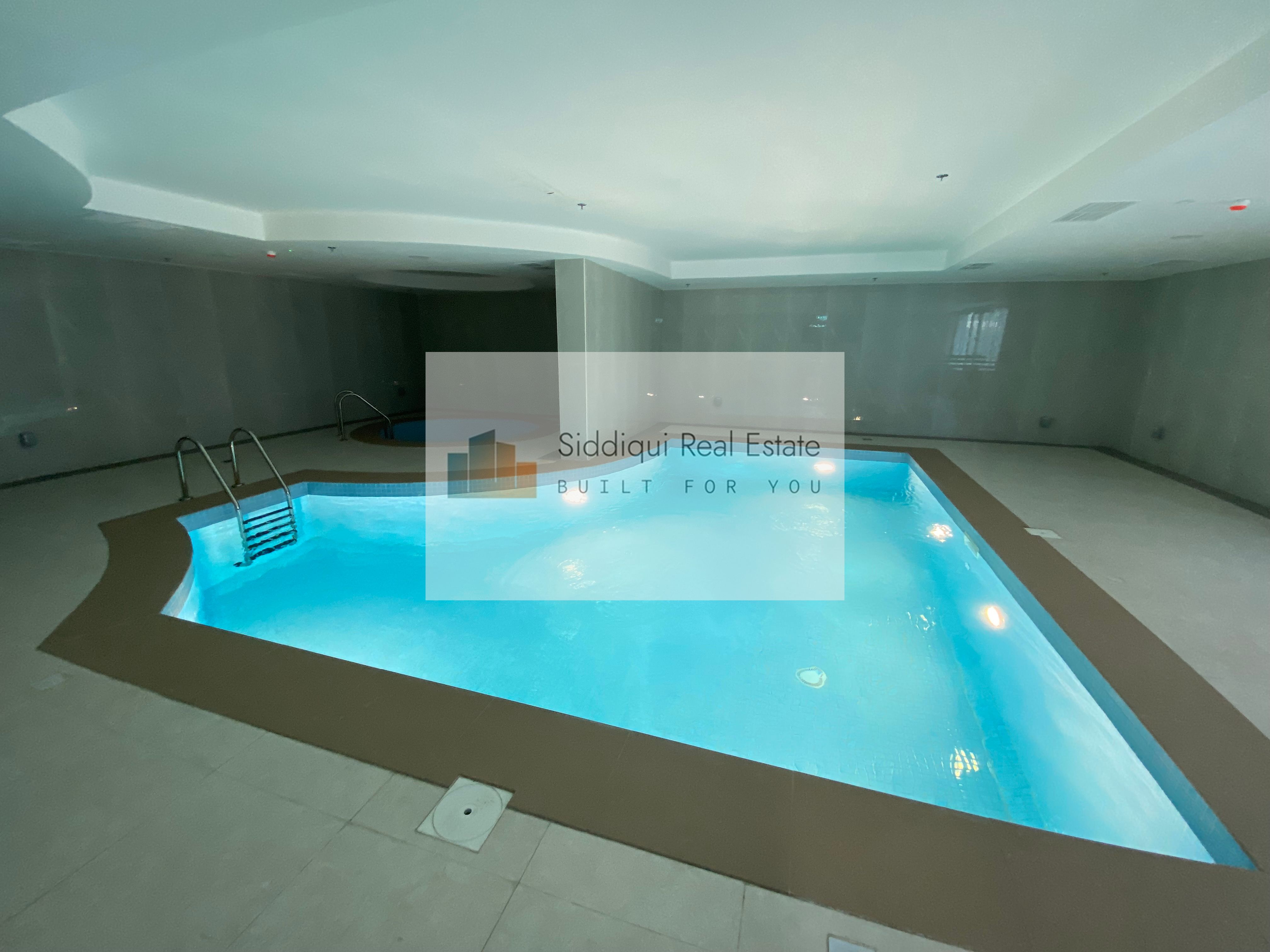 Brand new building one month free 2bhk with parking and gym pool free class to Dubai exit available in Al Nahda Sharjah