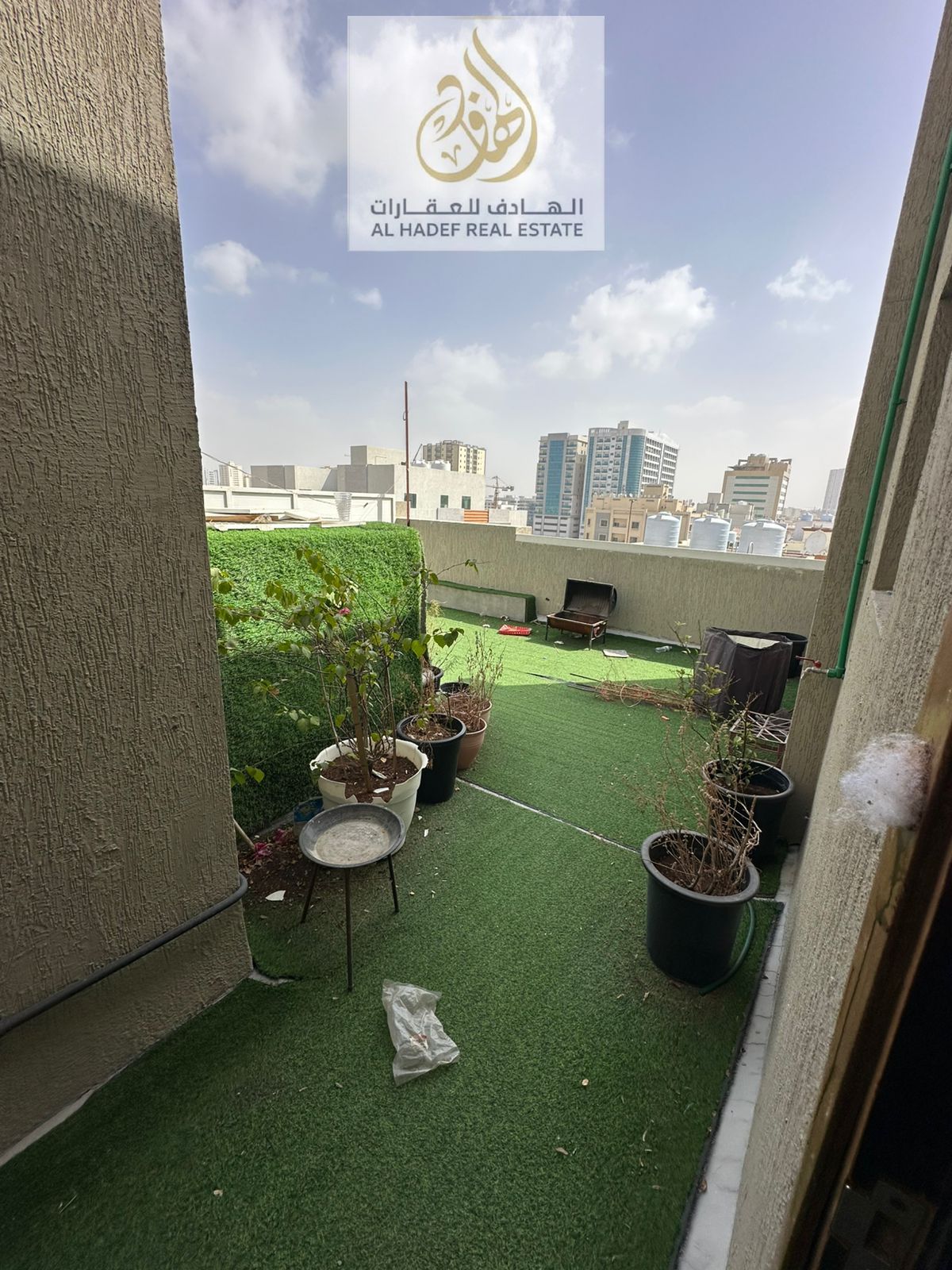 One-bedroom apartment with a private rooftop terrace and parking. Two bathrooms, master bedroom. Location: Al-Jarf 2, near the National School and Al-