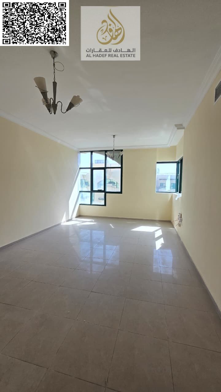 Two-bedroom apartment with a living room for annual rent in Al Rashidiya Towers, Ajman. Opposite Nesto Hypermarket. Apartment area: 1566 sq ft. Separa