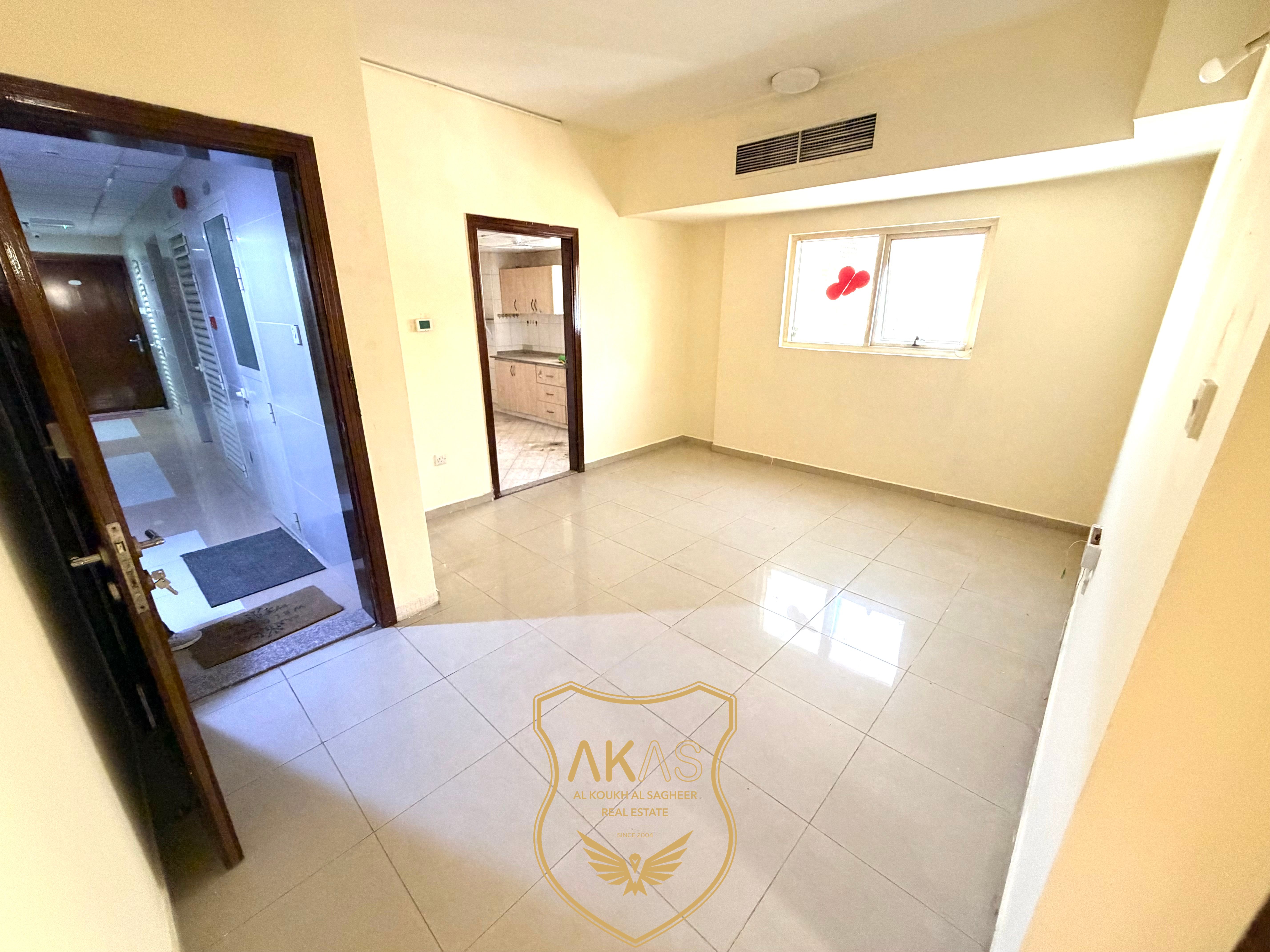 Like a New Building 1BHK apartment available with central AC just in 24999 AED