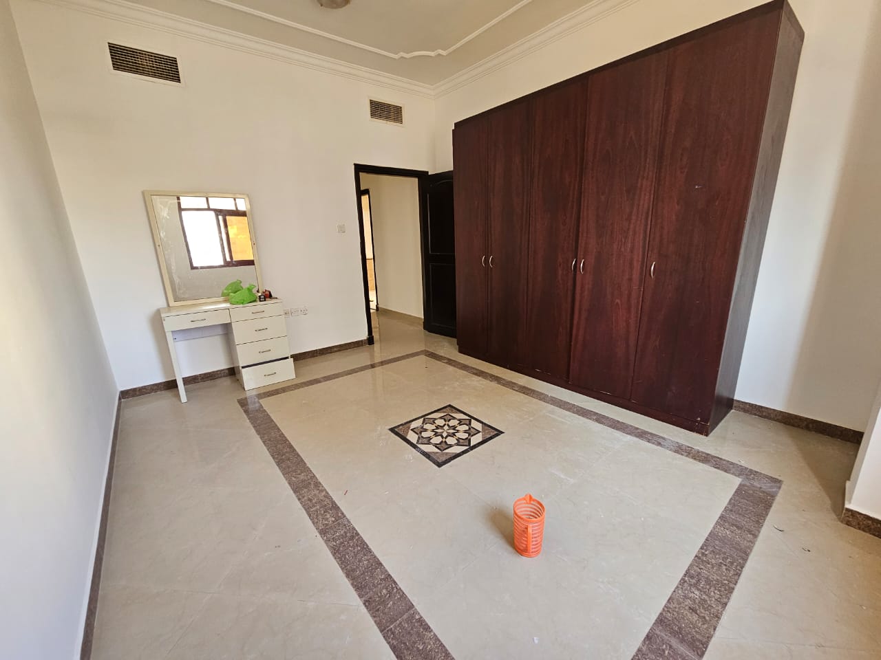 Spacious outdoor parking areas, prime and lively location close to shops and cafes, and near the Dubai exit.