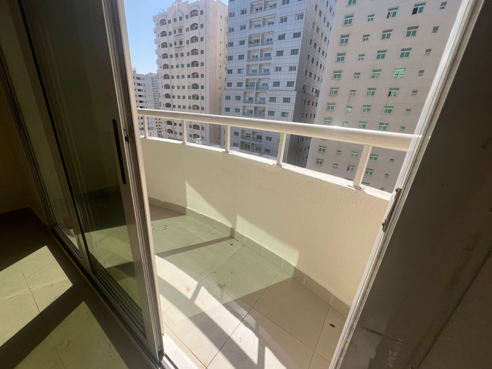 Two-bedroom apartment with living room for rent in **Abu Shagara – Al Hayat area**, suitable space, lively location, close to all services and transpo