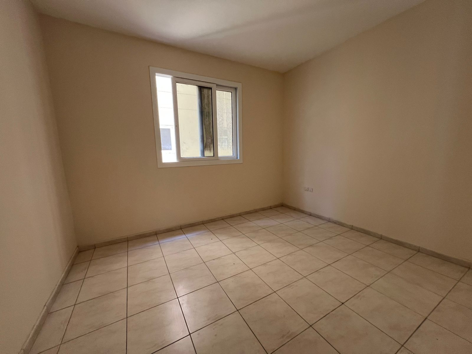 Luxury apartment in Al Majarah, modern finish, 2 baths, good size, central AC, prime location, great price.