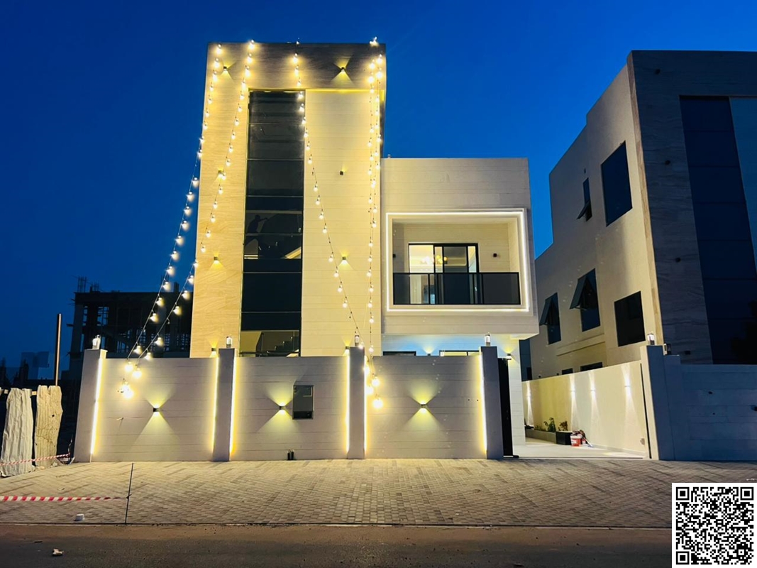 Modern European-style villa for sale in Al Helio area, Ajman. Excellent location opposite the mosque. Two floors plus a rooftop terrace. Registration