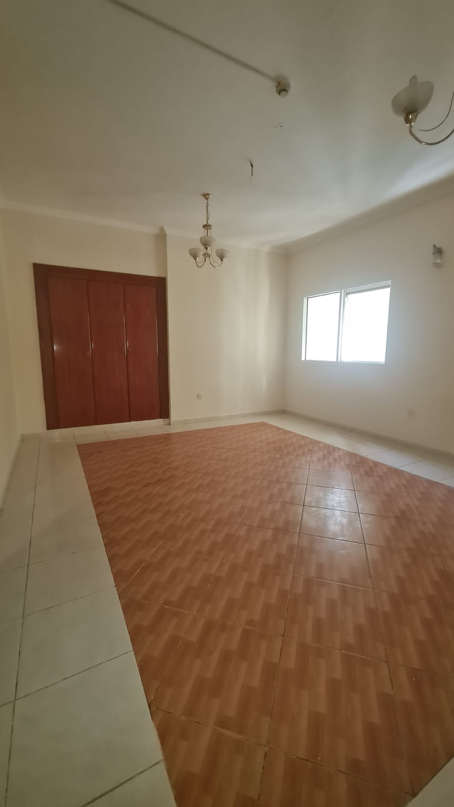 Two-bedroom apartment for rent in Al Qasimia, strategically located close to all services and transportation, making it an ideal choice for families