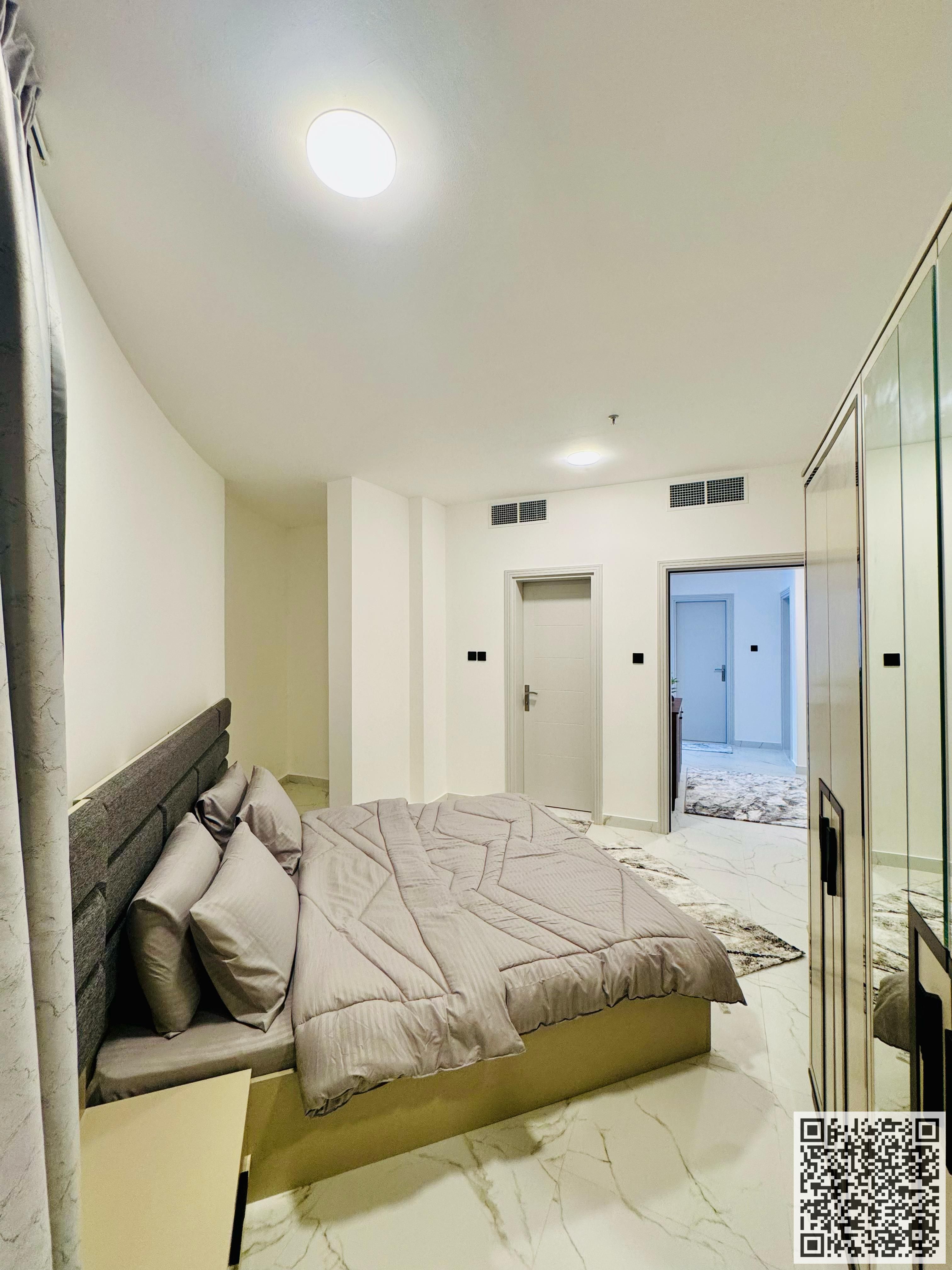 Luxurious furnished one-bedroom apartment with brand new furniture for monthly rent in Ajman - Ajman Corniche