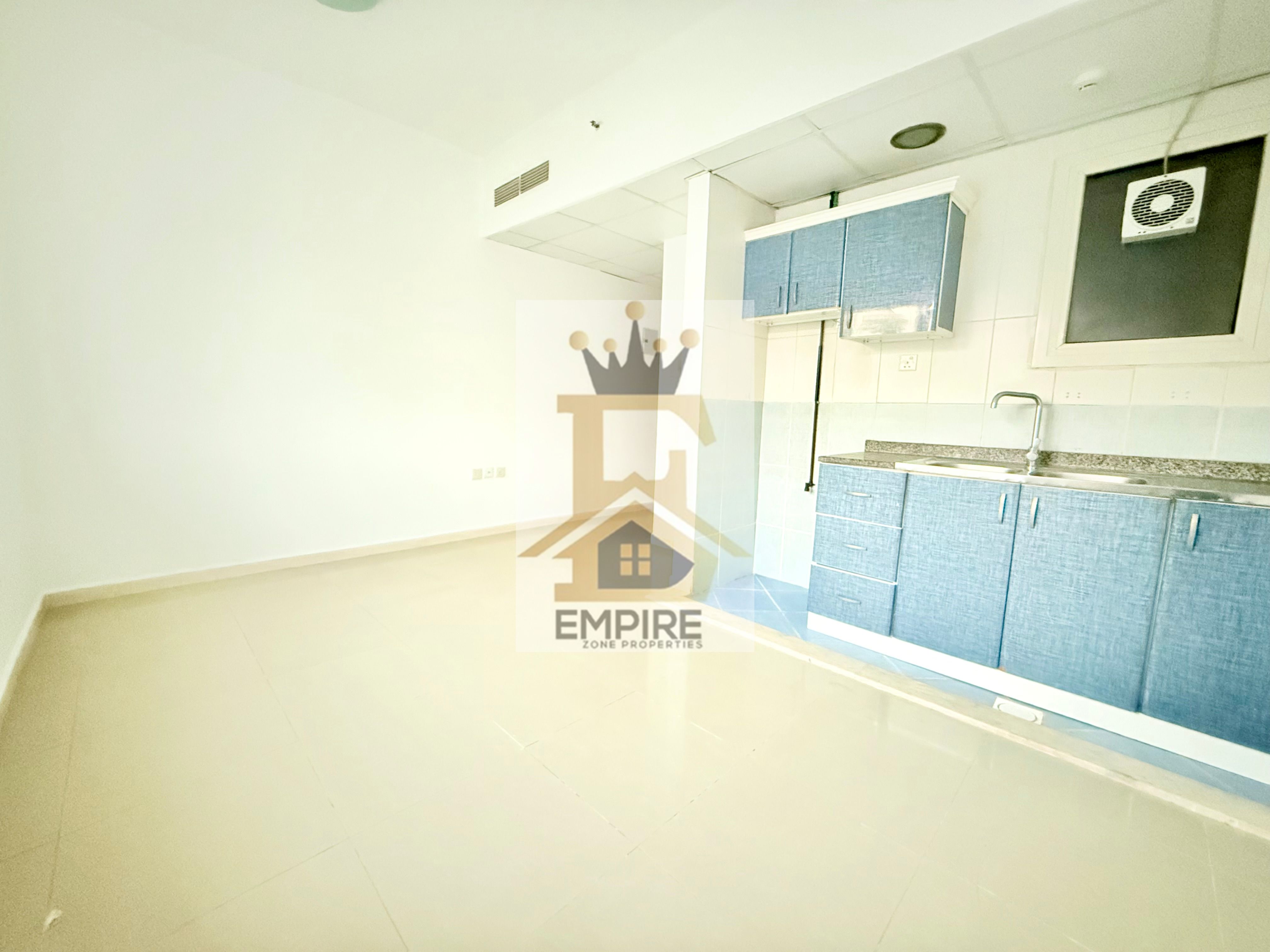 Bright spacious studio in very Prime location open view free gym and pool very Easy Exit to Dubai