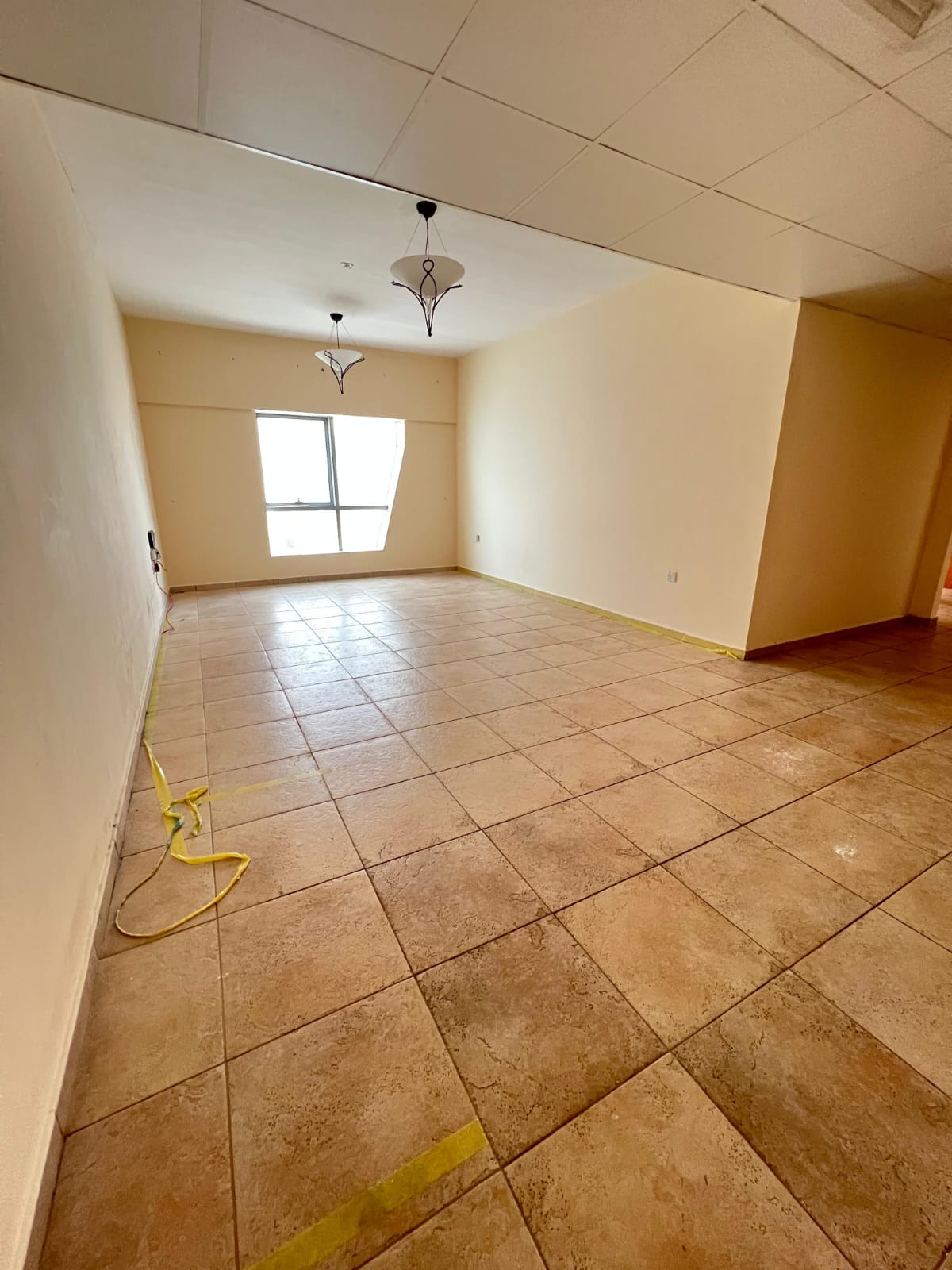 2BR apartment in Al Majaz 2, free parking & AC, gym & pool access, 1 month free, premium tower, prime location.