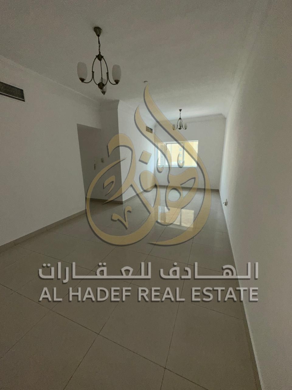 For rent in Al Khan - Room and living room available + 2 bathrooms + free maintenance throughout the rental period