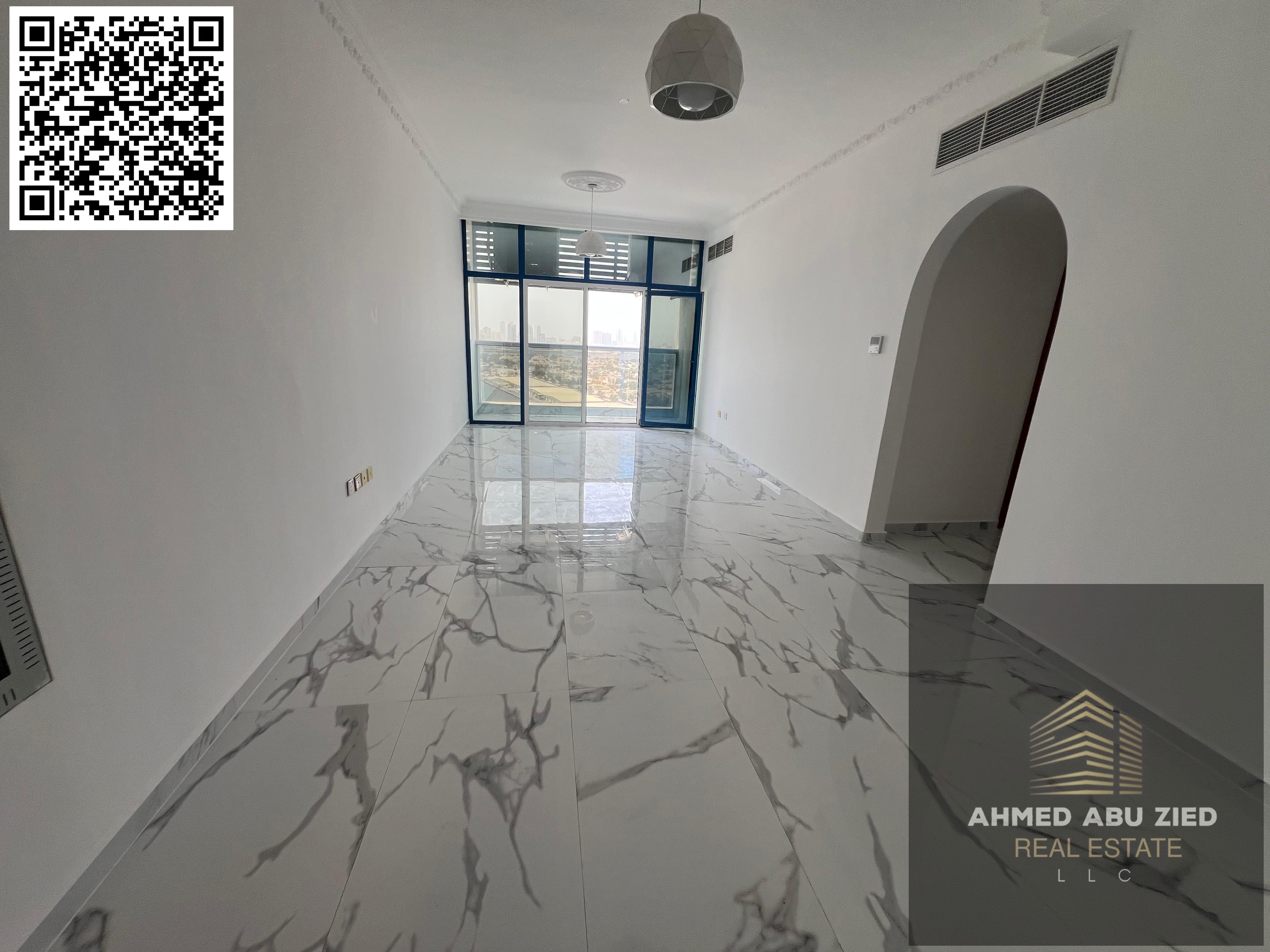 Luxury two-bedroom apartment in Mushrif, Ajman | 2 bathrooms | Hotel-style finishing | Central air conditioning | Balcony with sea view | Free parking