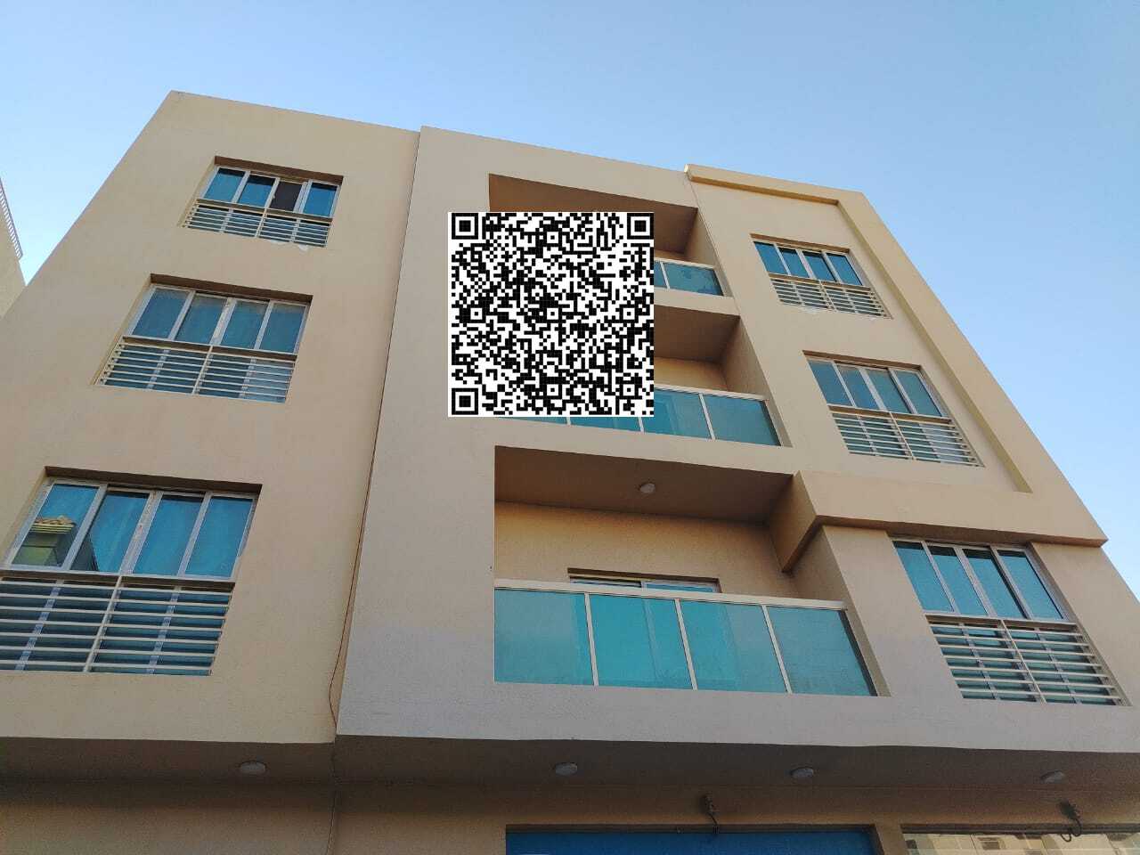 Building for sale in Al-Aliya area, Ajman. Land area: 287.5 square meters. Building age: 4 years; consists of 3 floors (ground floor + 3 floors).