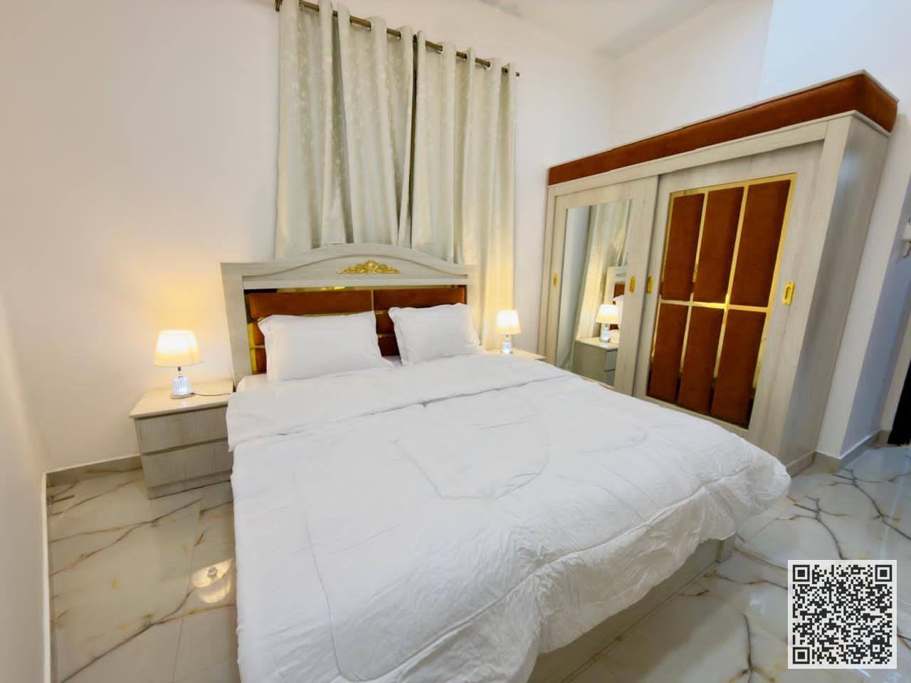 Luxurious and elegant one-bedroom apartment, fully furnished with brand new, high-end furniture, including all bills, internet, and a garden.