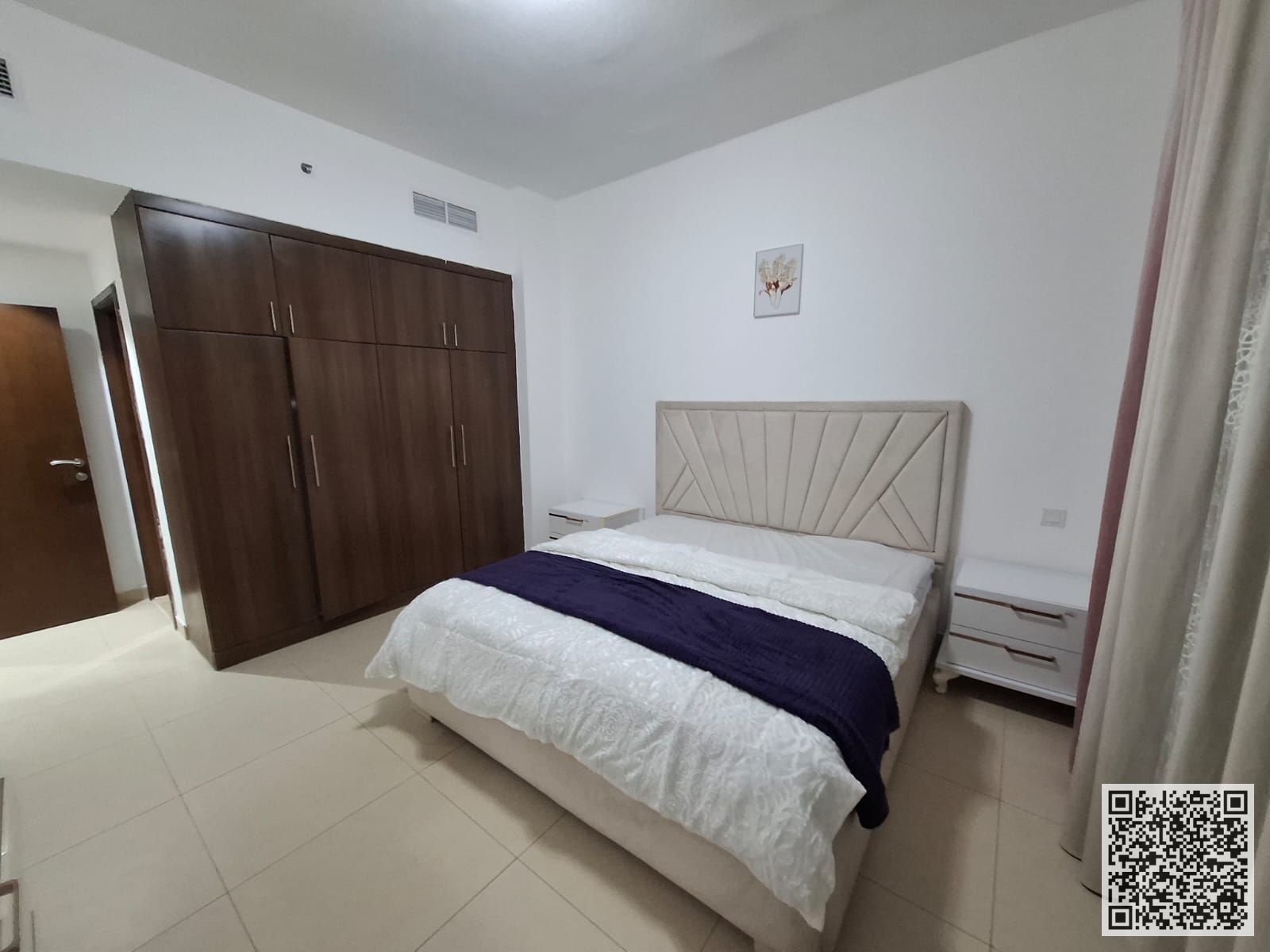 Luxurious and elegant fully furnished one-bedroom apartment with brand new, high-end furnishings, including all bills, internet, and a private parking