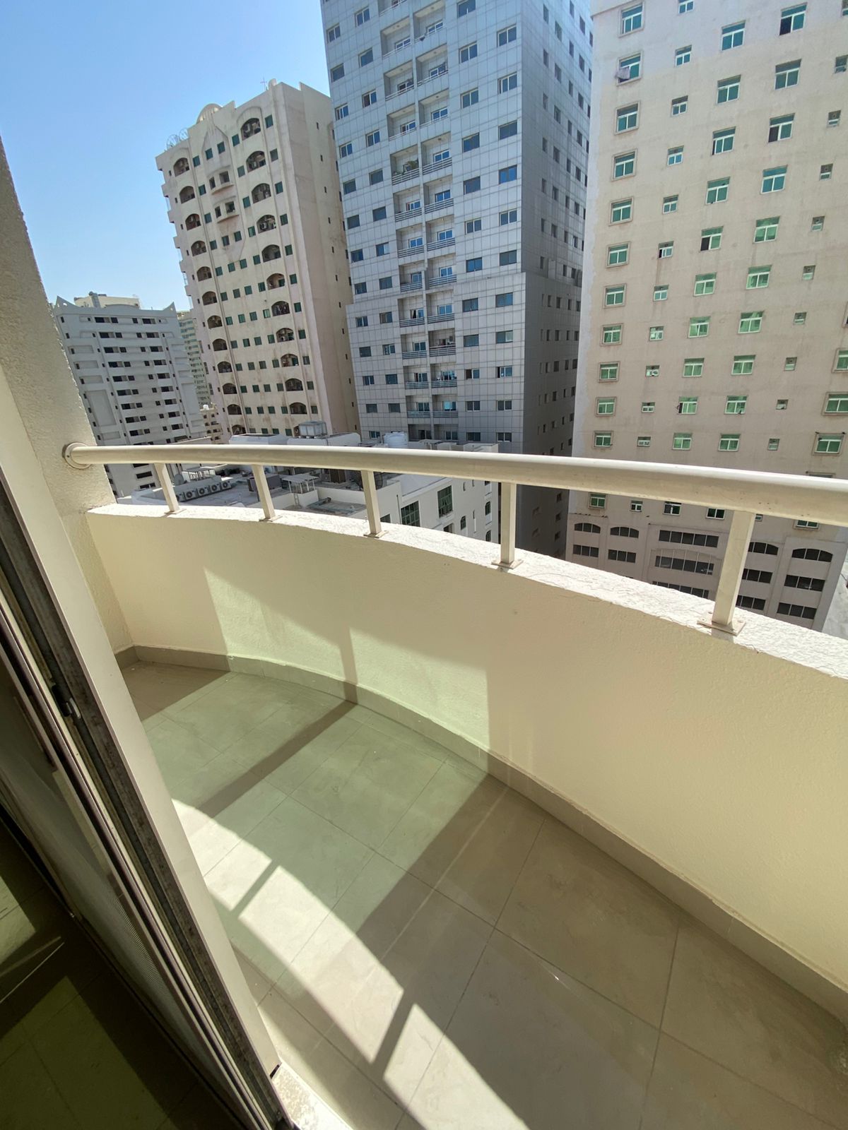 2 bedroom apartment in Abu Shagara, large space, 2 bathrooms, balcony, central AC. Rent AED 40,000 in 4 payments.