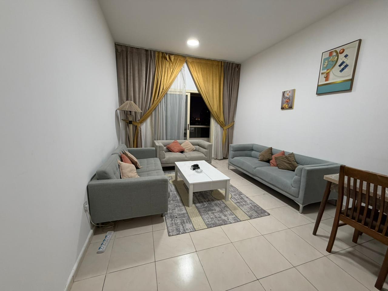 Furnished two-bedroom apartment with living room for rent in **Al Taawun**, new second-occupancy furniture, comfortable layout, prime location close t