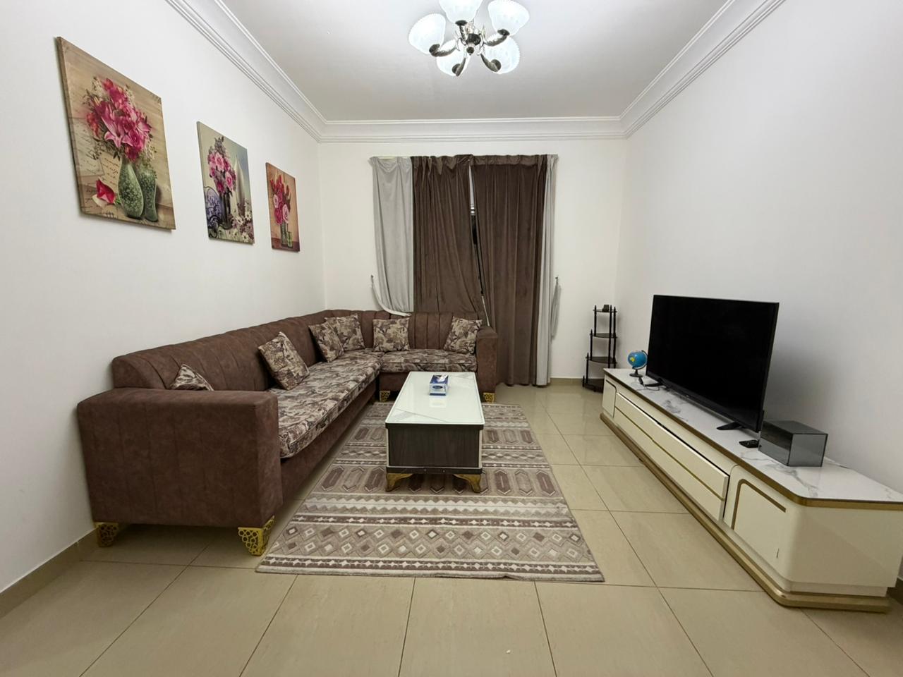 Furnished one-bedroom apartment with living room for rent in **Al Taawun**, 2 bathrooms, ready to move in, close to services.