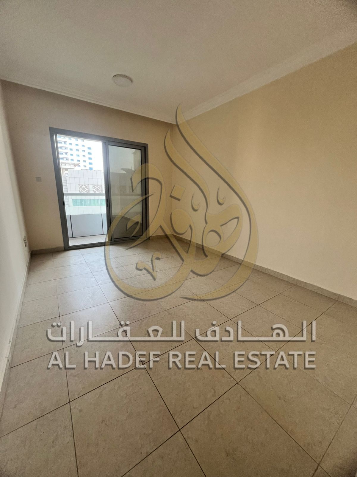 Available for rent in Al Taawun - One bedroom and living room - Spacious - 2 bathrooms + balcony + Free parking