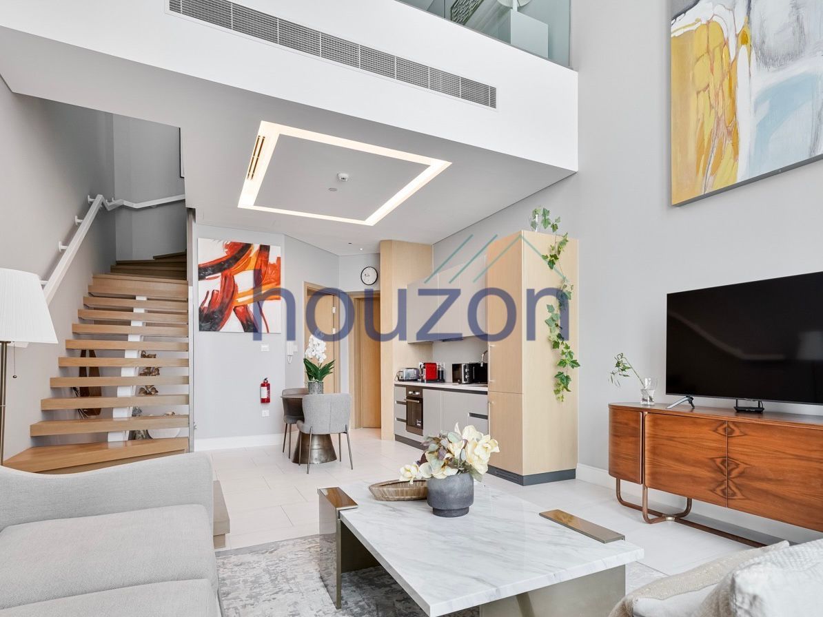 Branded + Luxurious 1BR Loft | Vacant | Burj View