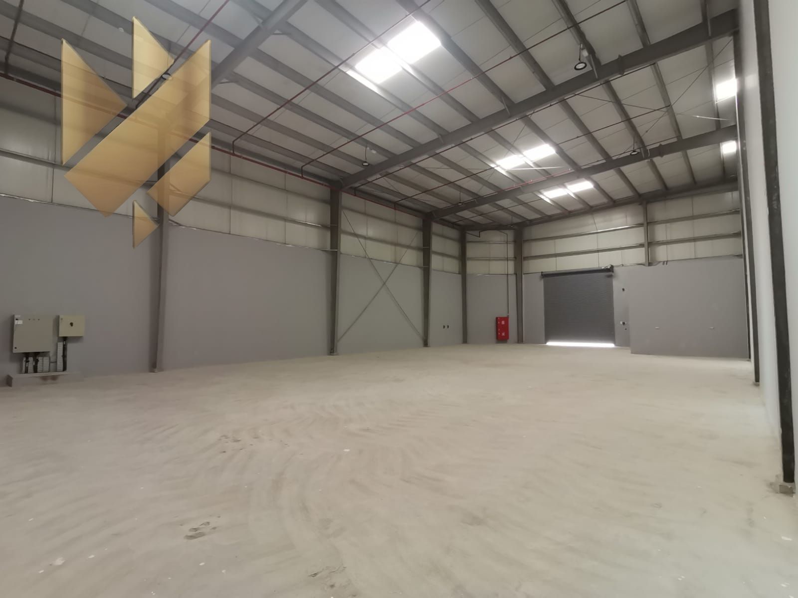 Industrial warehouse in Al Sajaa with high-voltage electricity (150 kW)