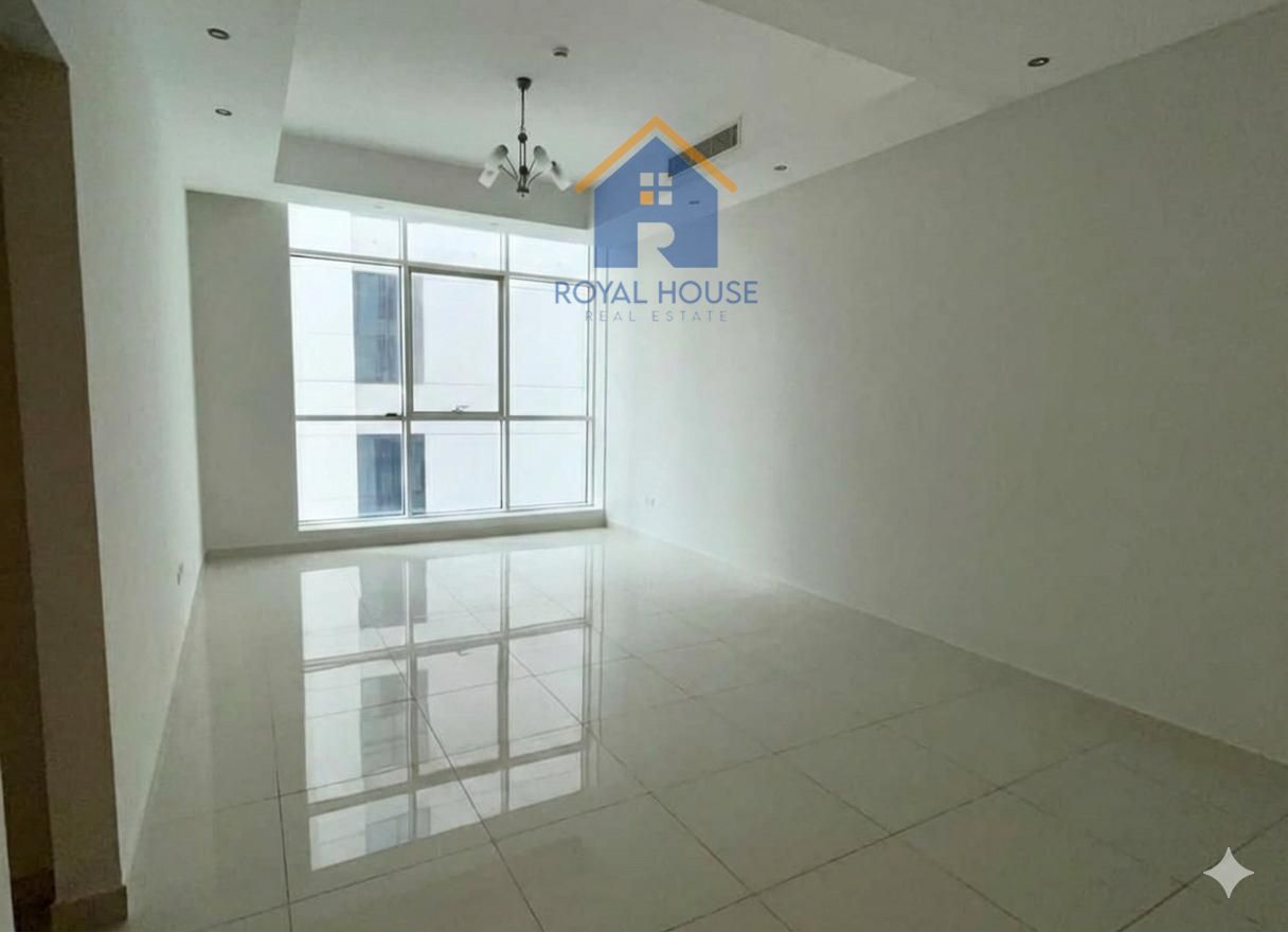 Two bedrooms and a living room with a parking space for sale in Al Khan