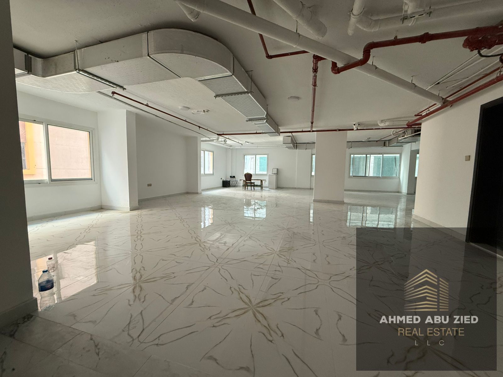 The finest office or commercial floor with spacious areas in Al Mowaihat 3 – Ajman, prime location in a new building with high-end finishing, ideal