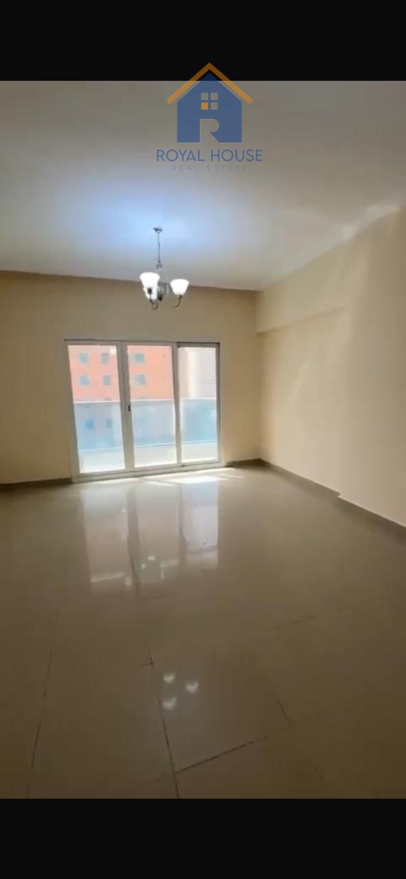 Two bedrooms, a living room, and a balcony for sale in Al Taawun.