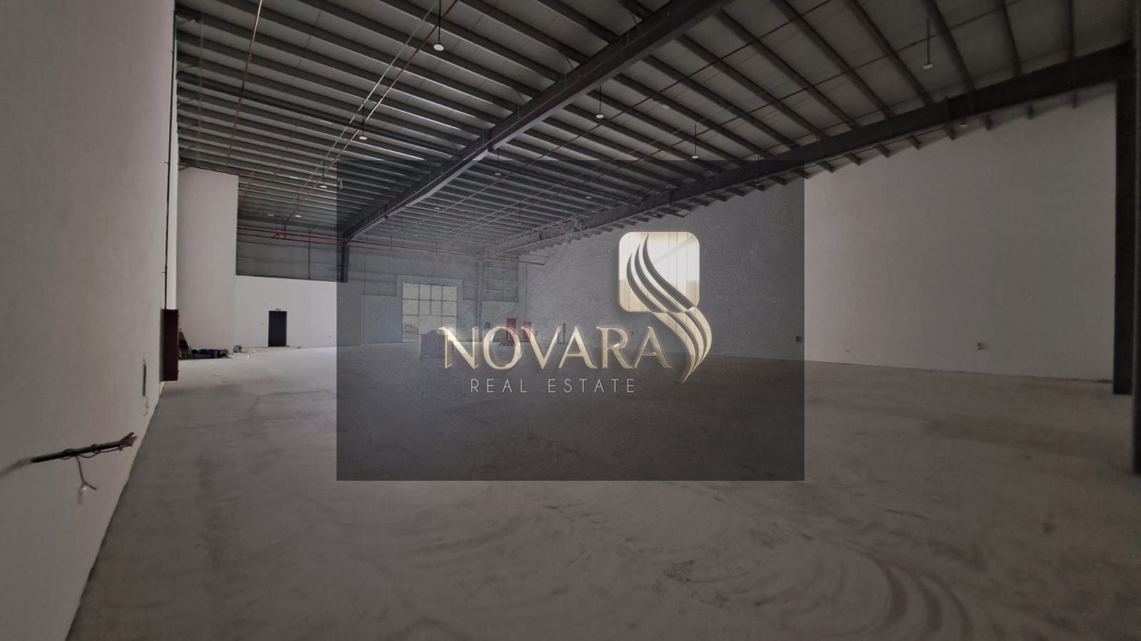 Warehouse for annual rent in Umm Al Quwain, with an area of 10,000 sq ft, 50 kW electricity, price 50 dirhams per sq ft